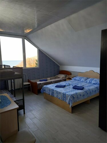 Семейный номер с видом на море в Тихий рай