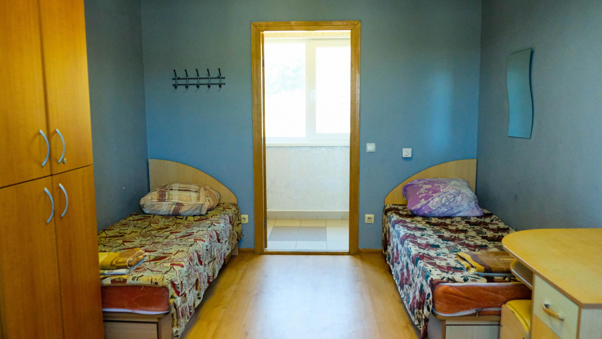 Четырехместный номер с общей ванной комнатой