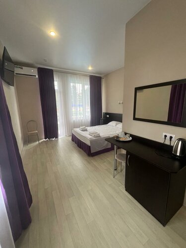 Четырехместный комфорт с балконом в Небесные Крылья