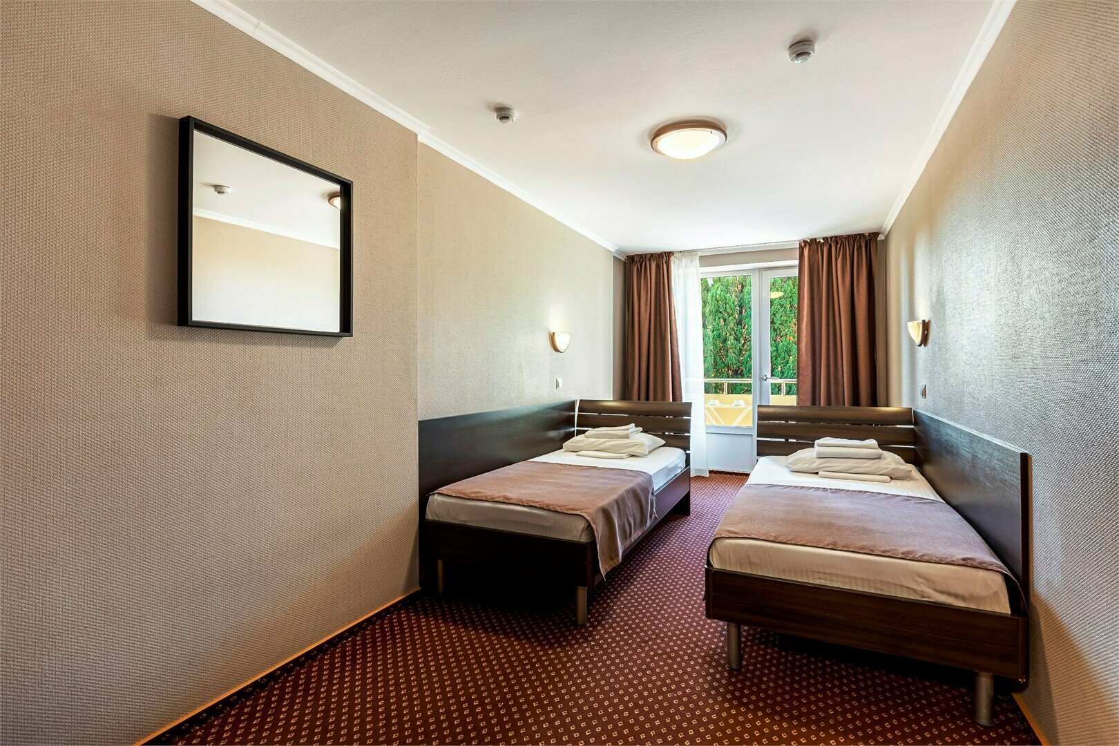 Двухместный номер без балкона и общими удобствами на этаже