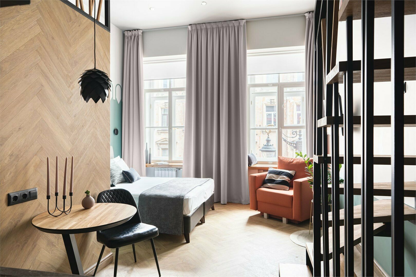 Двухуровневый номер-студио Делюкс