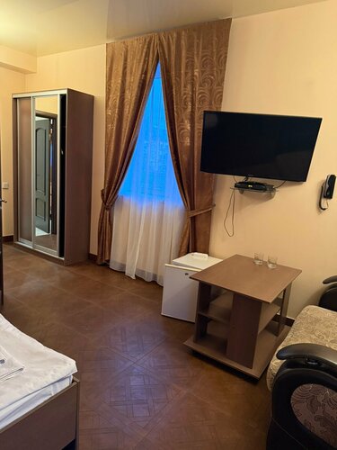 Стандартный номер с 2 односпальными кроватями и диваном в Дуэт