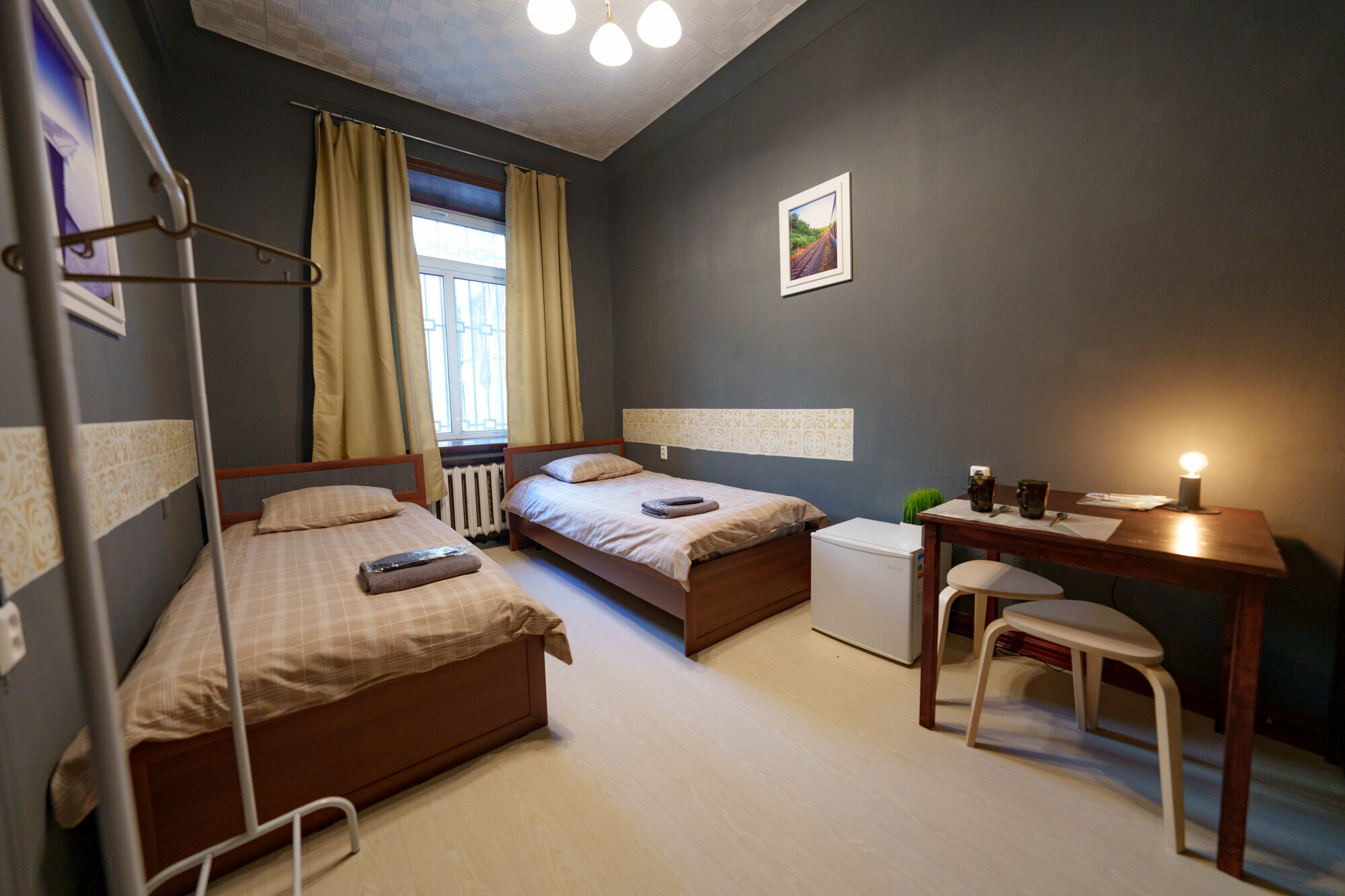 Двухместный номер с 2 отдельными кроватями и общей ванной комнатой