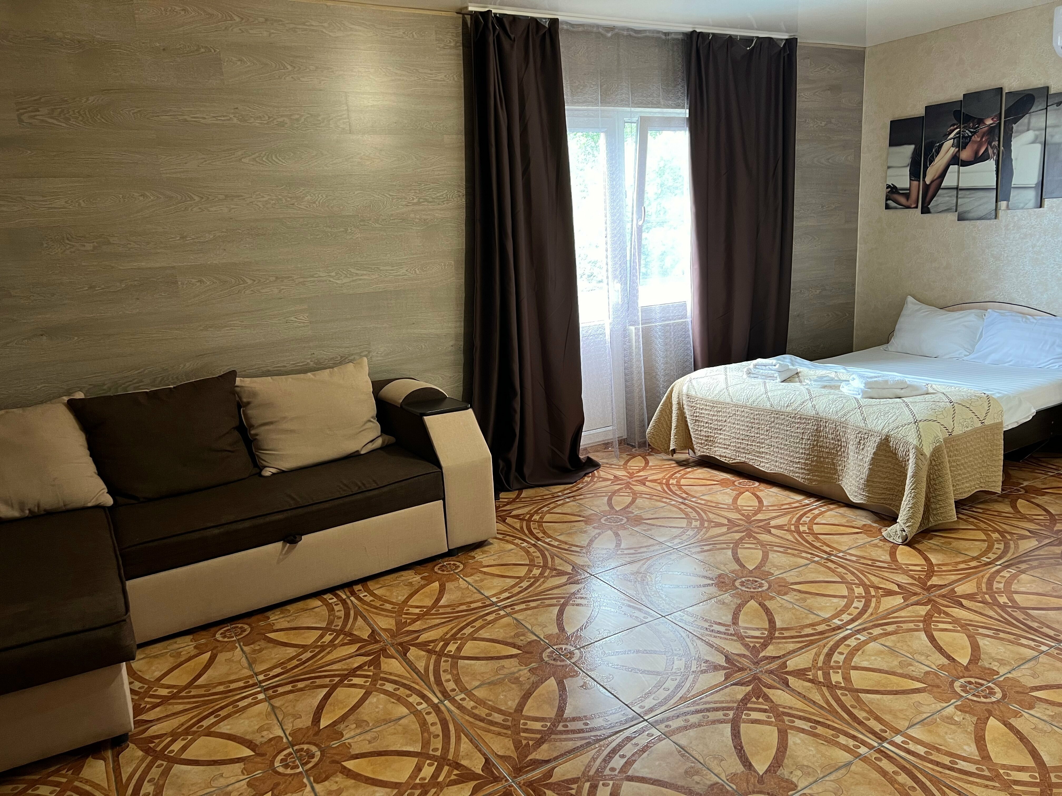 Номер-студия с бaлконом