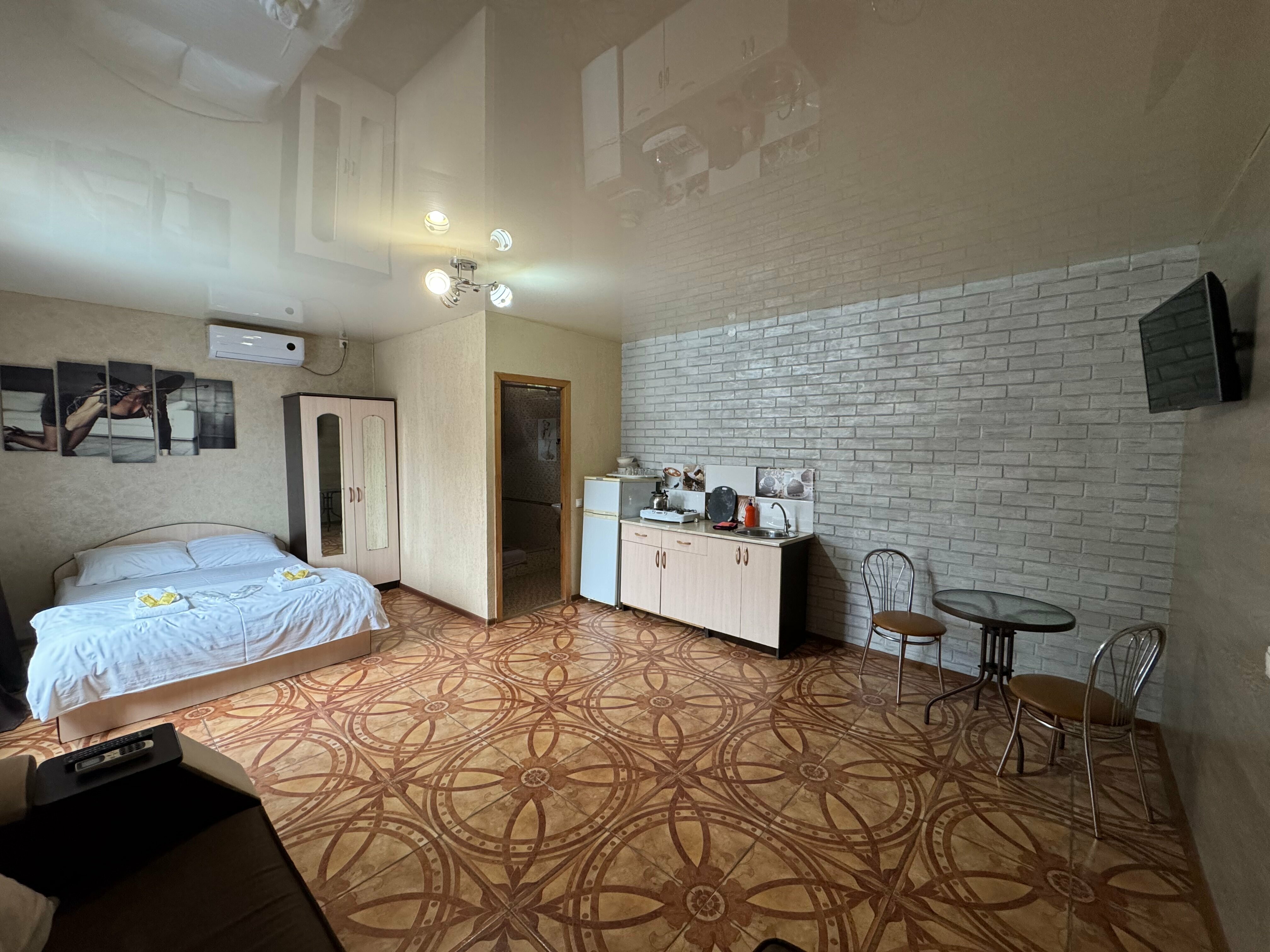 Номер-студия с бaлконом