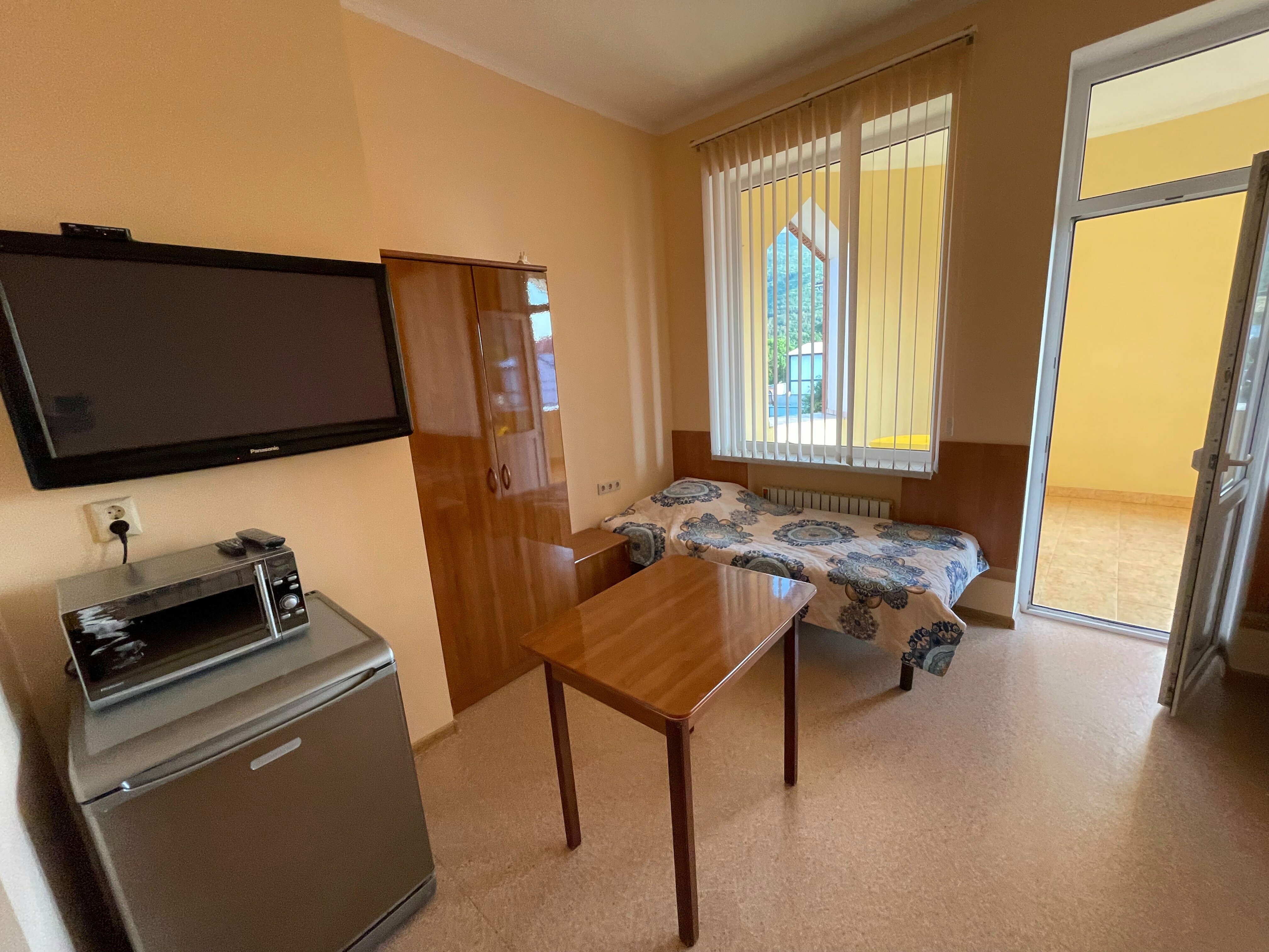 Номер-студия с видом на сад