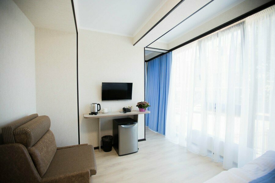 Трехместный номер Делюкс