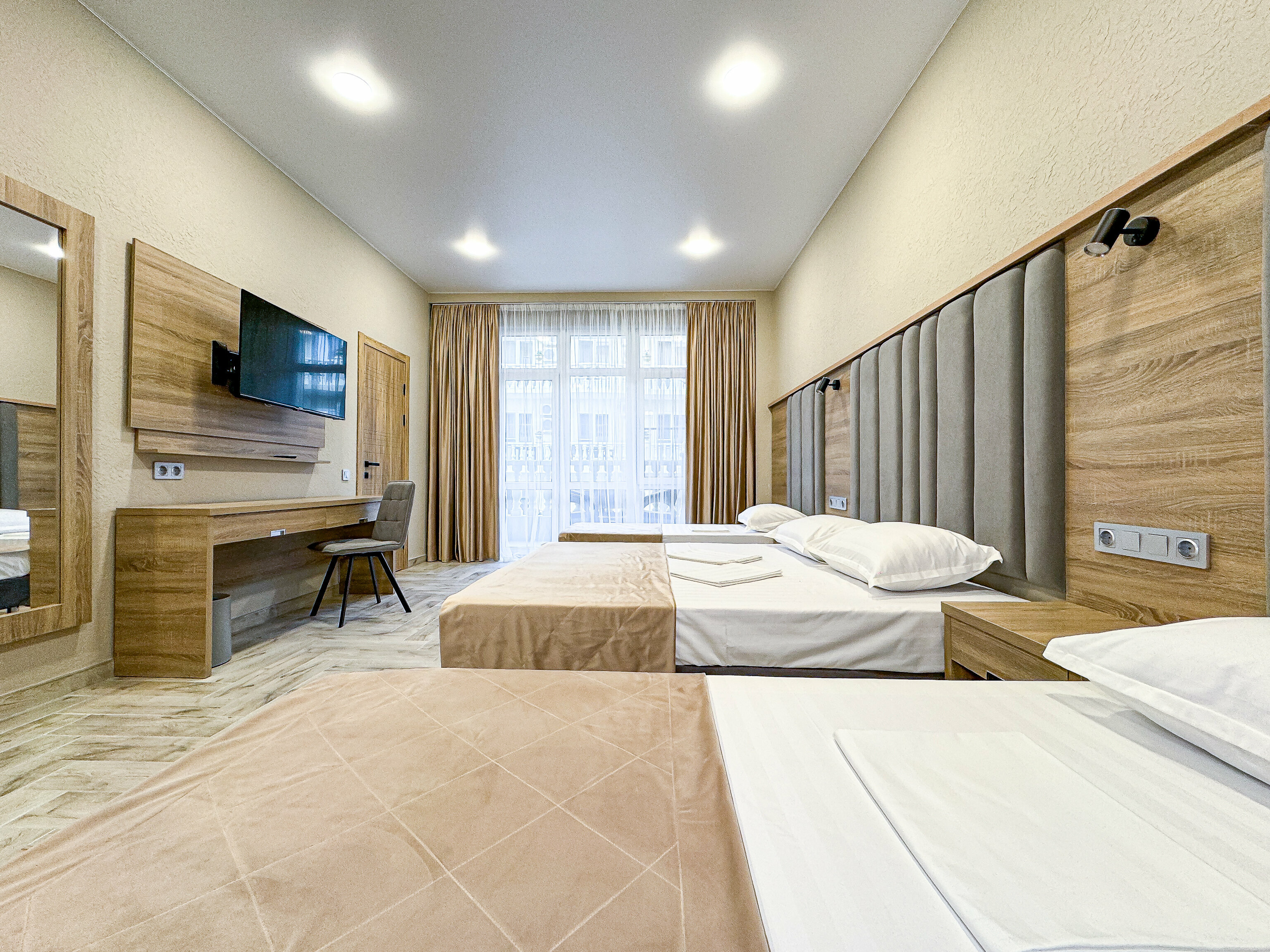 Четырехместный номер Делюкс