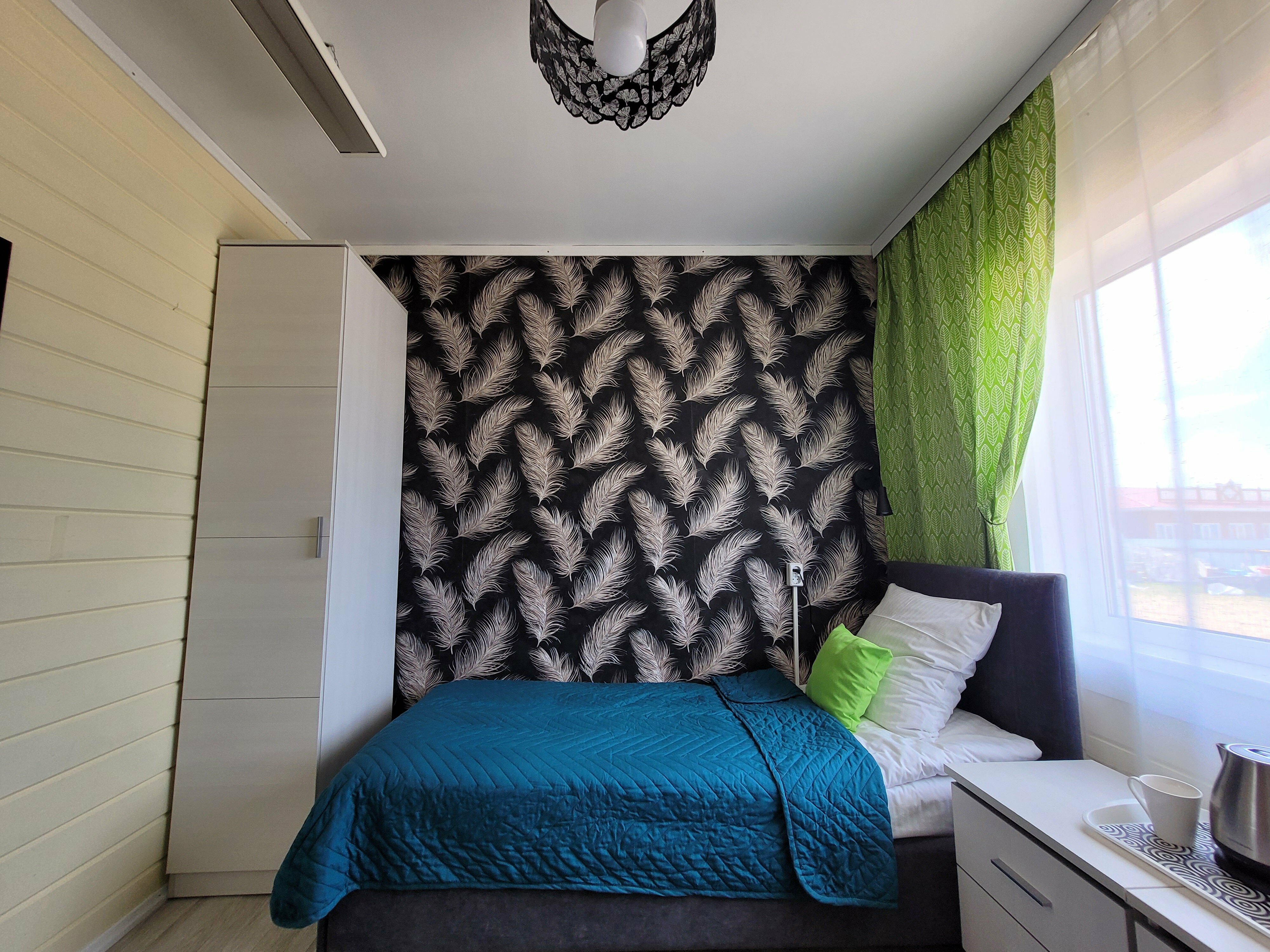 Двухместный номер с 2 отдельными кроватями и общей ванной комнатой