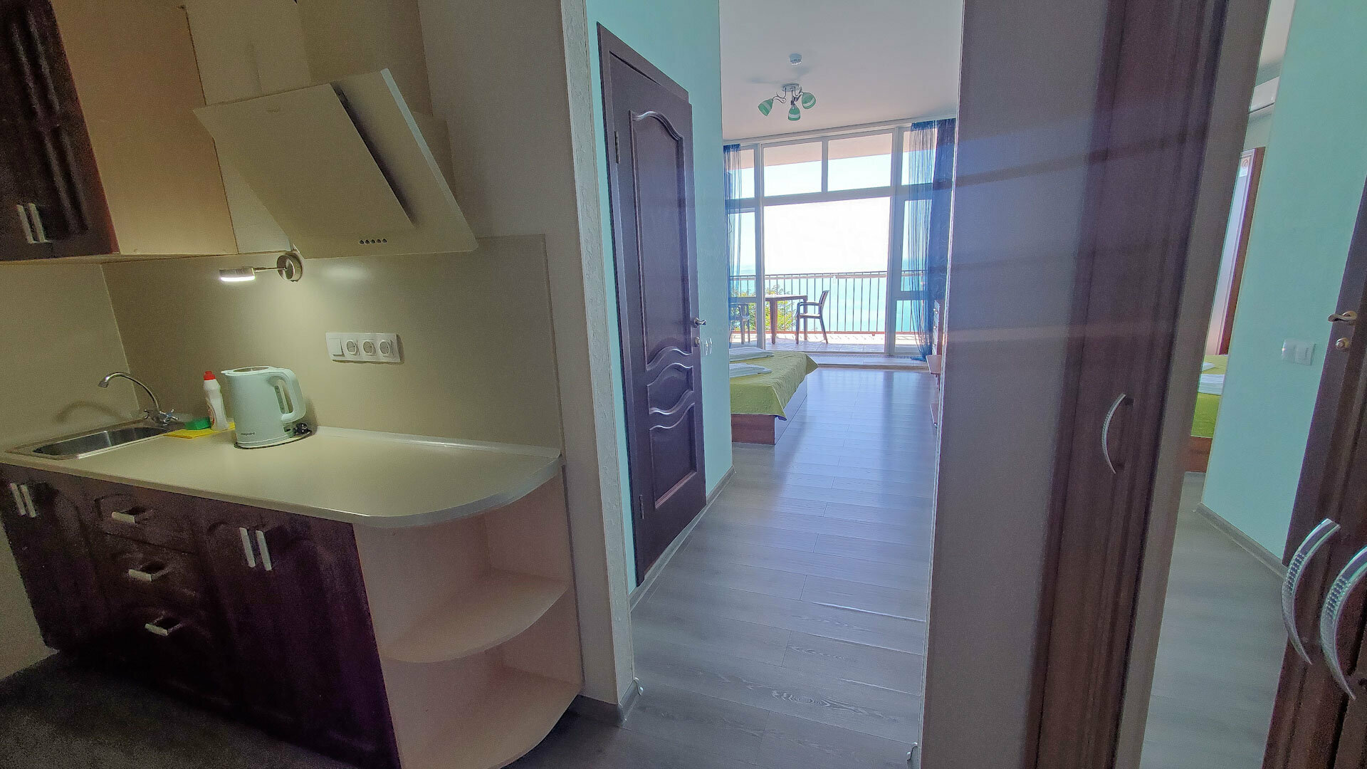 Двухместный однокомнатный люкс с кухней и видом на море