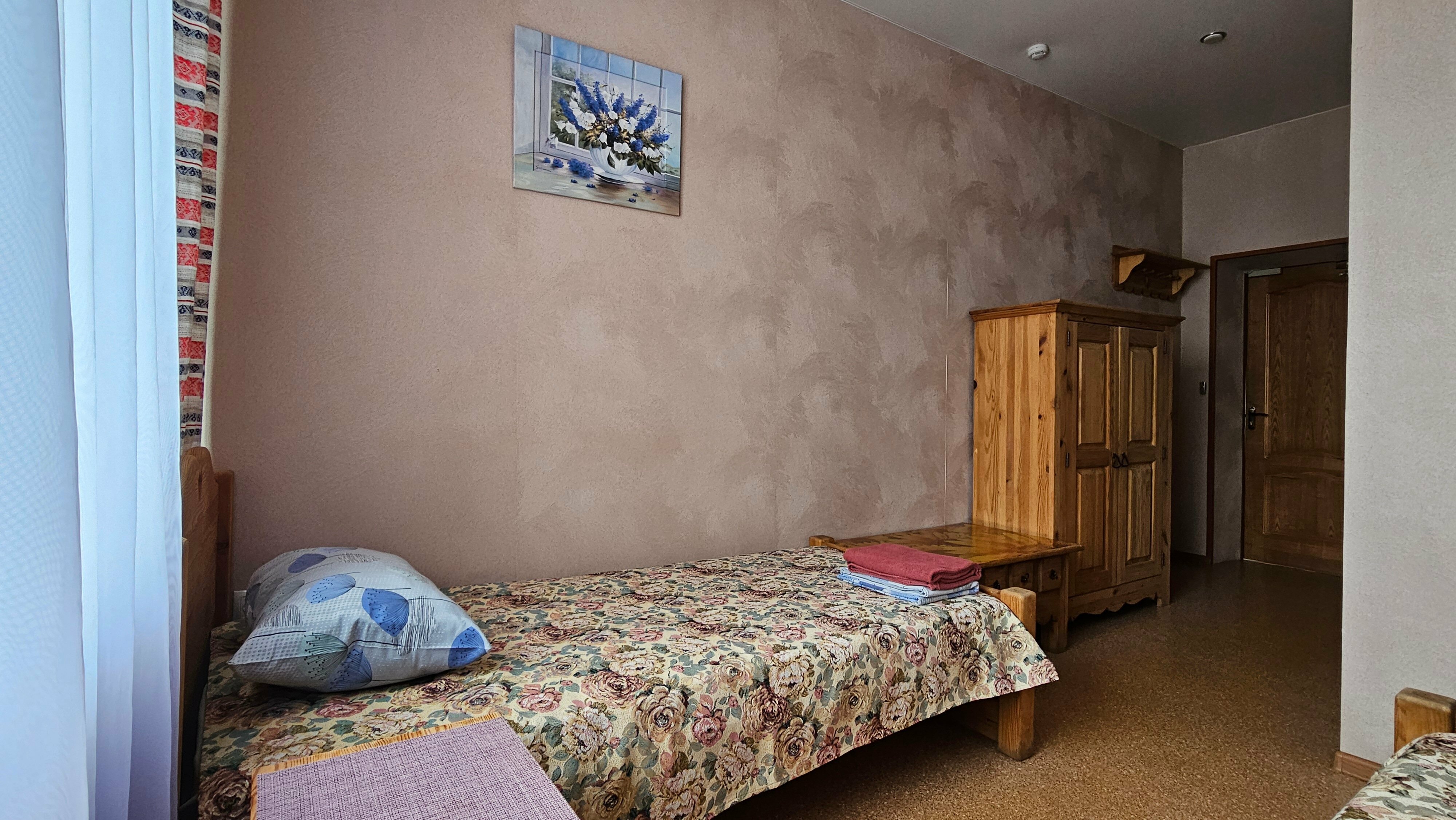 Двухместный номер с 2 отдельными кроватями и душем