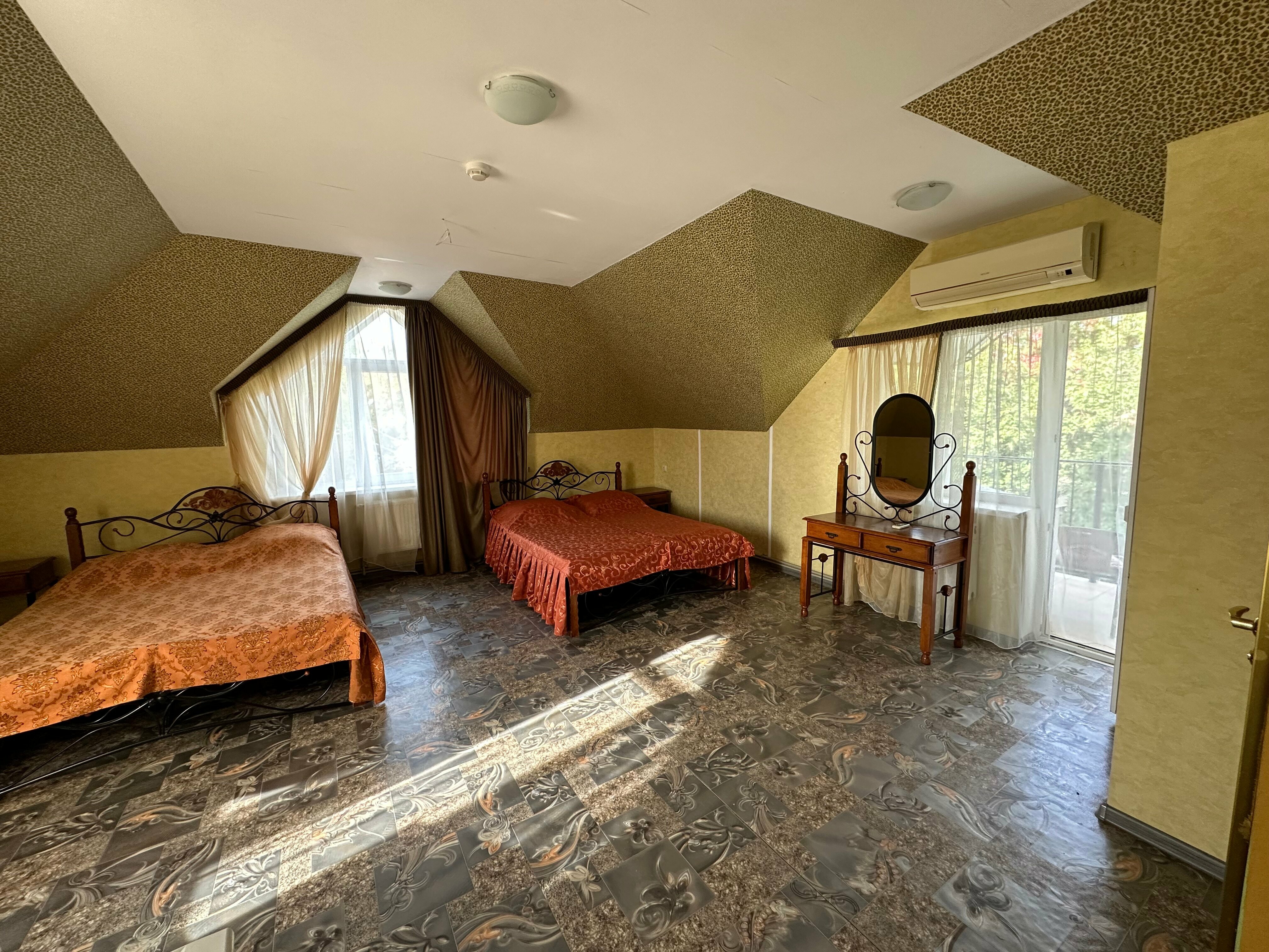 Улучшенный четырехместный номер