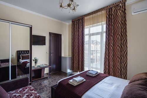 Стандартный трехместный номер в Манолис