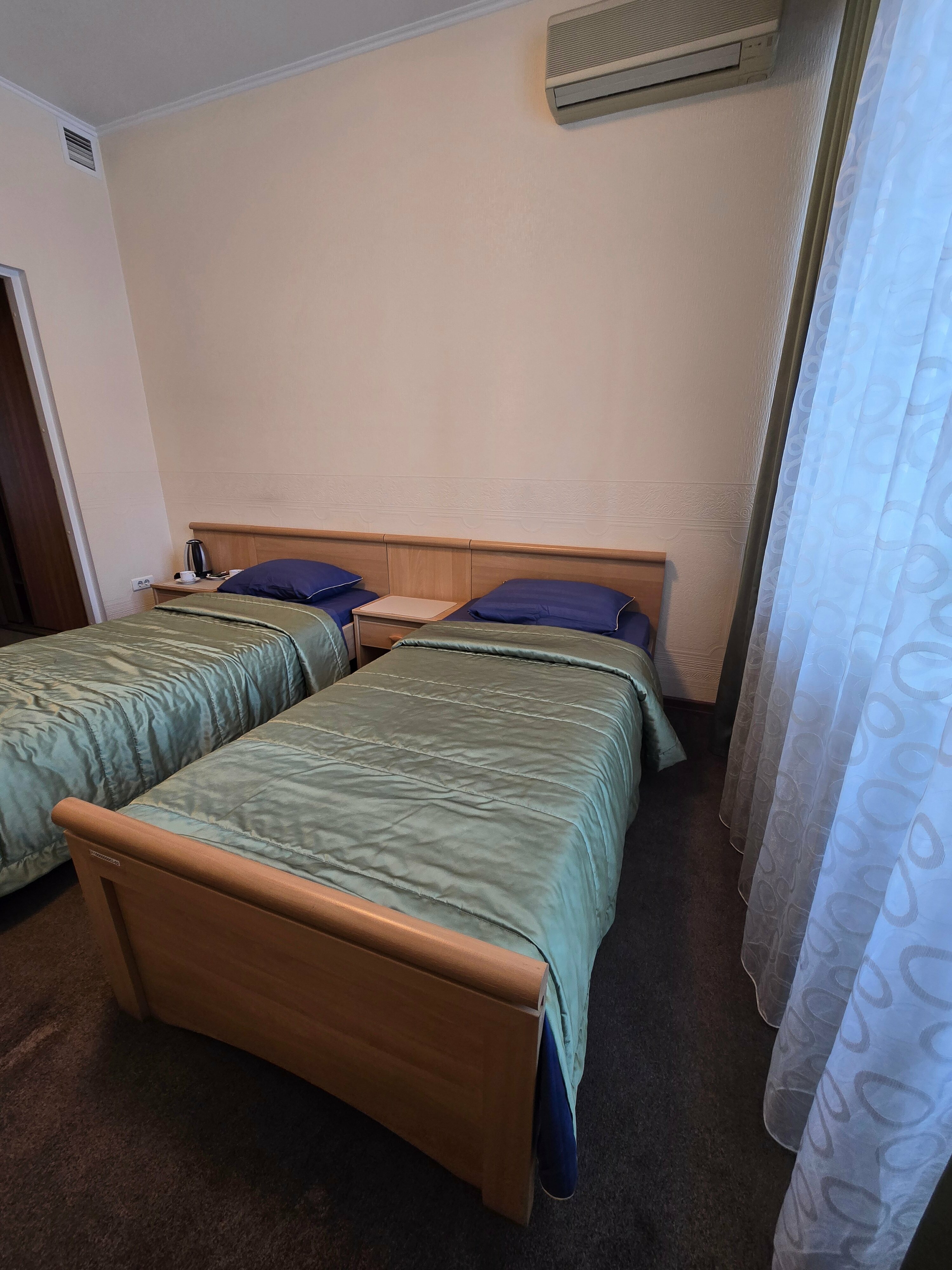 Двухместный номер с 2 отдельными кроватями и балконом