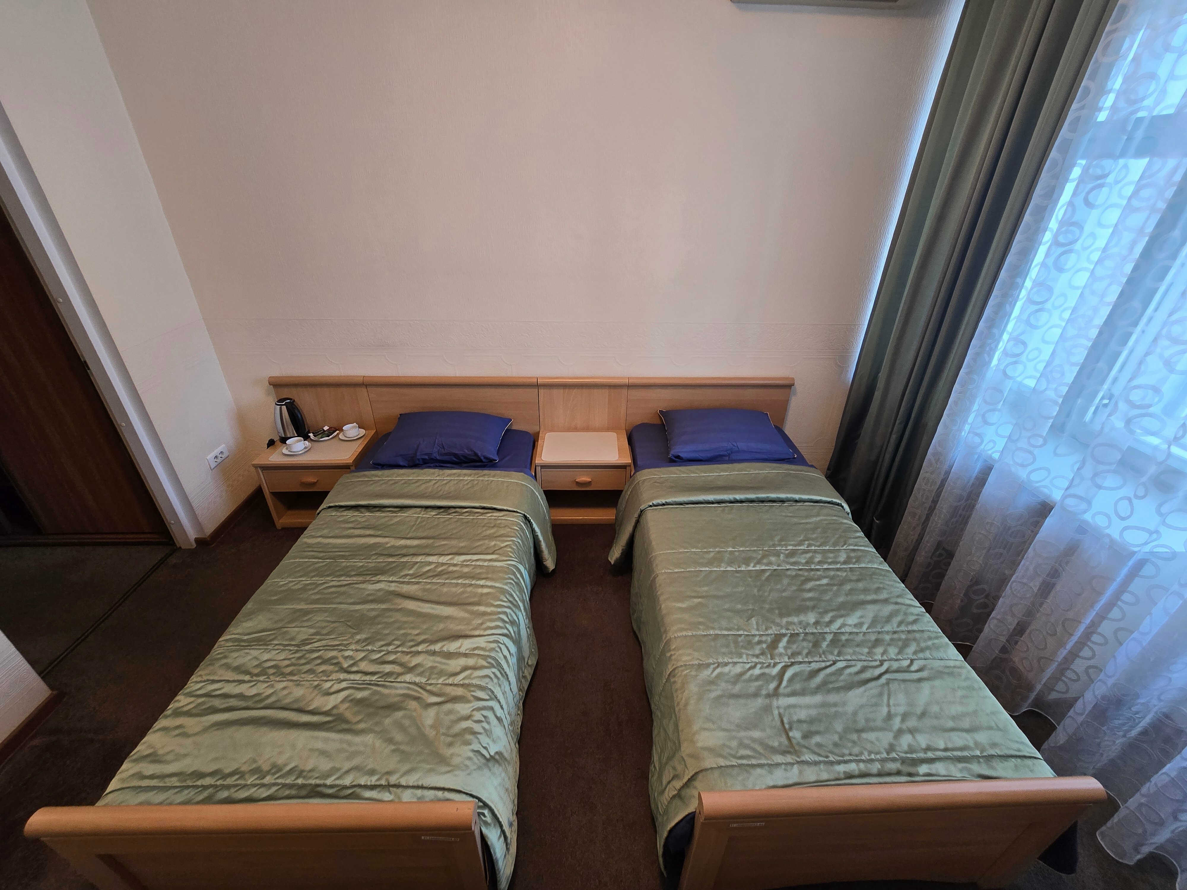 Двухместный номер с 2 отдельными кроватями и балконом