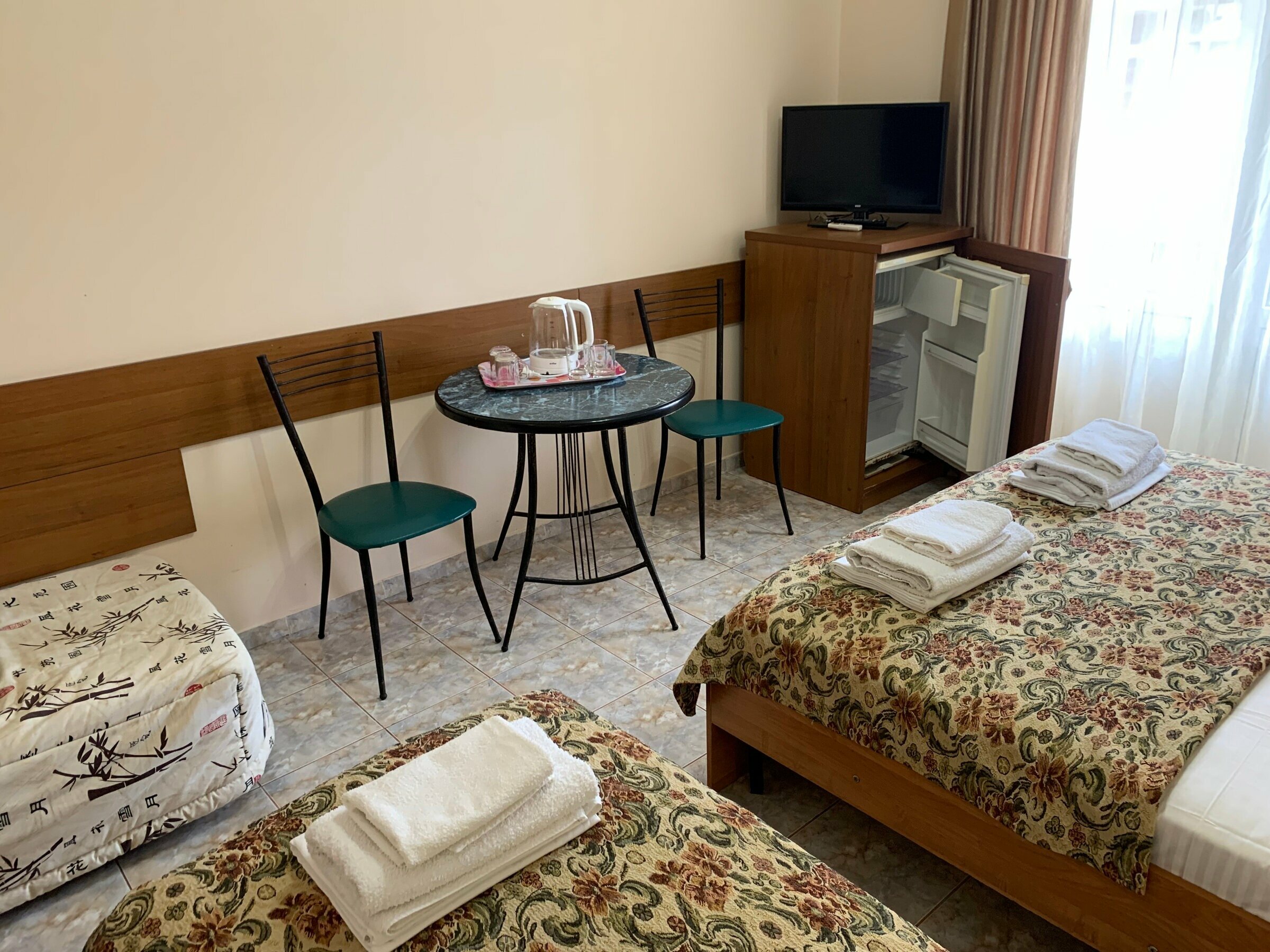 Трехместный номер с балконом