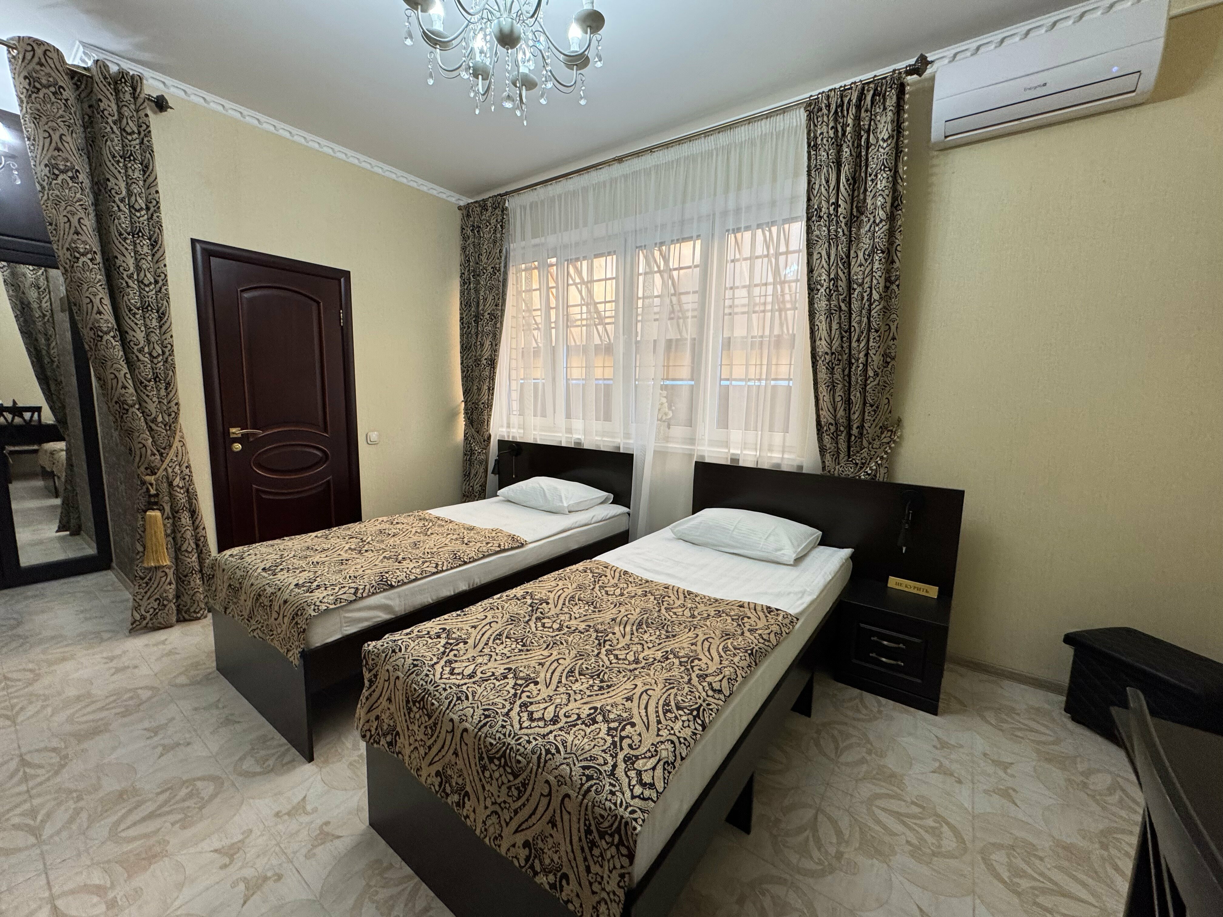 Номер Комфорт с кроватью King- size  или 2 раздельные кровати