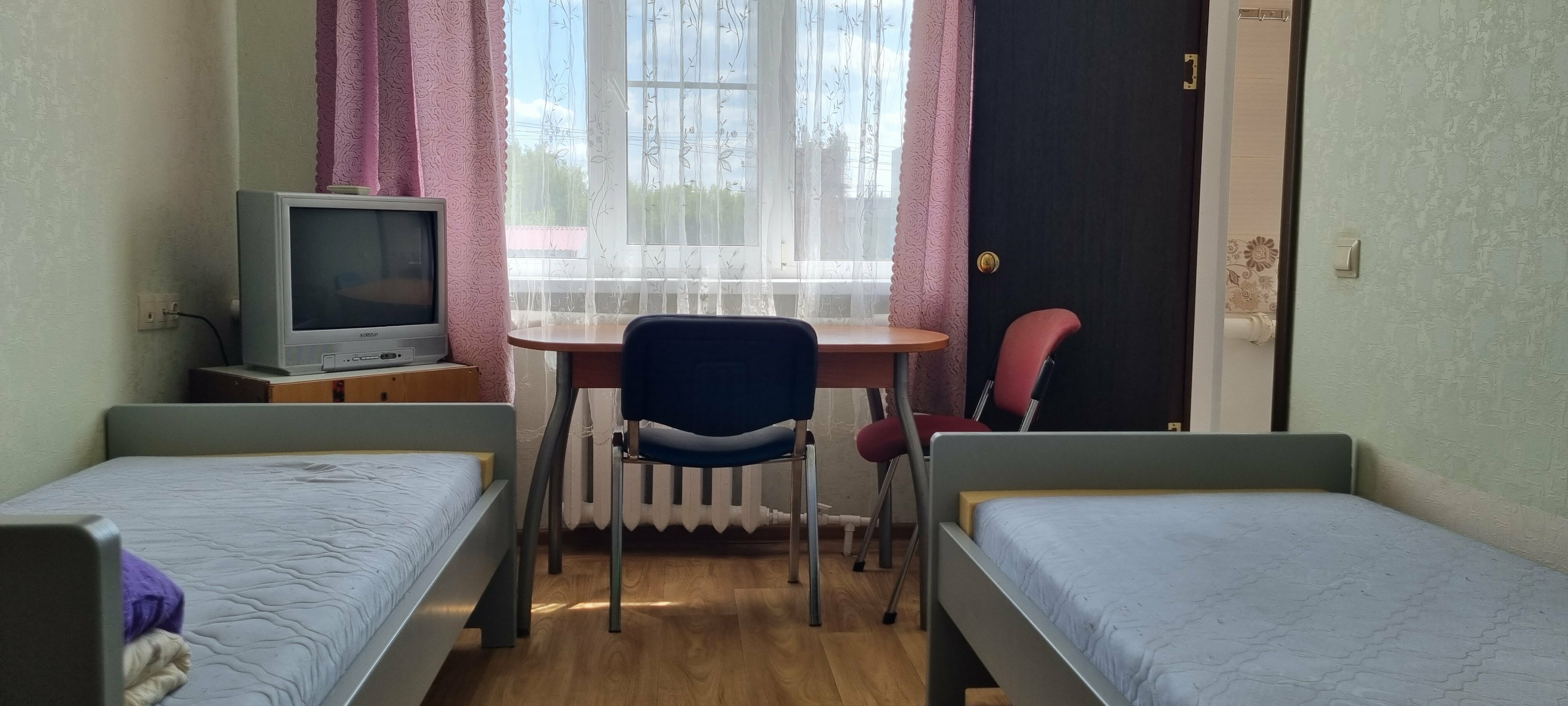 Двухместный номер эконом-класса с 2 отдельными кроватями