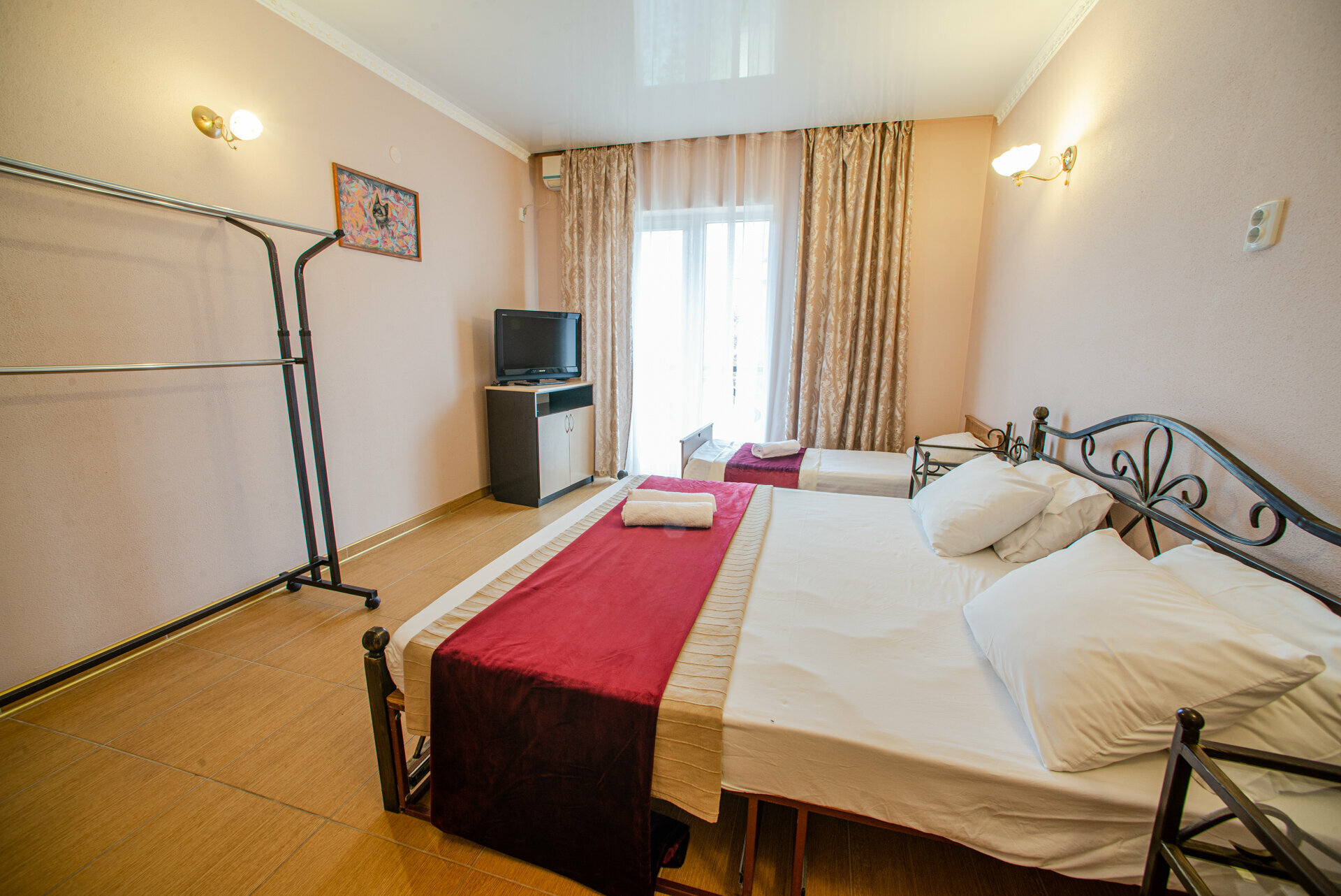 Трехместный номер Делюкс