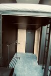Номер панорамным видом на Москву и антресольной видовой кроватью в Say Wow Capsule Hotel
