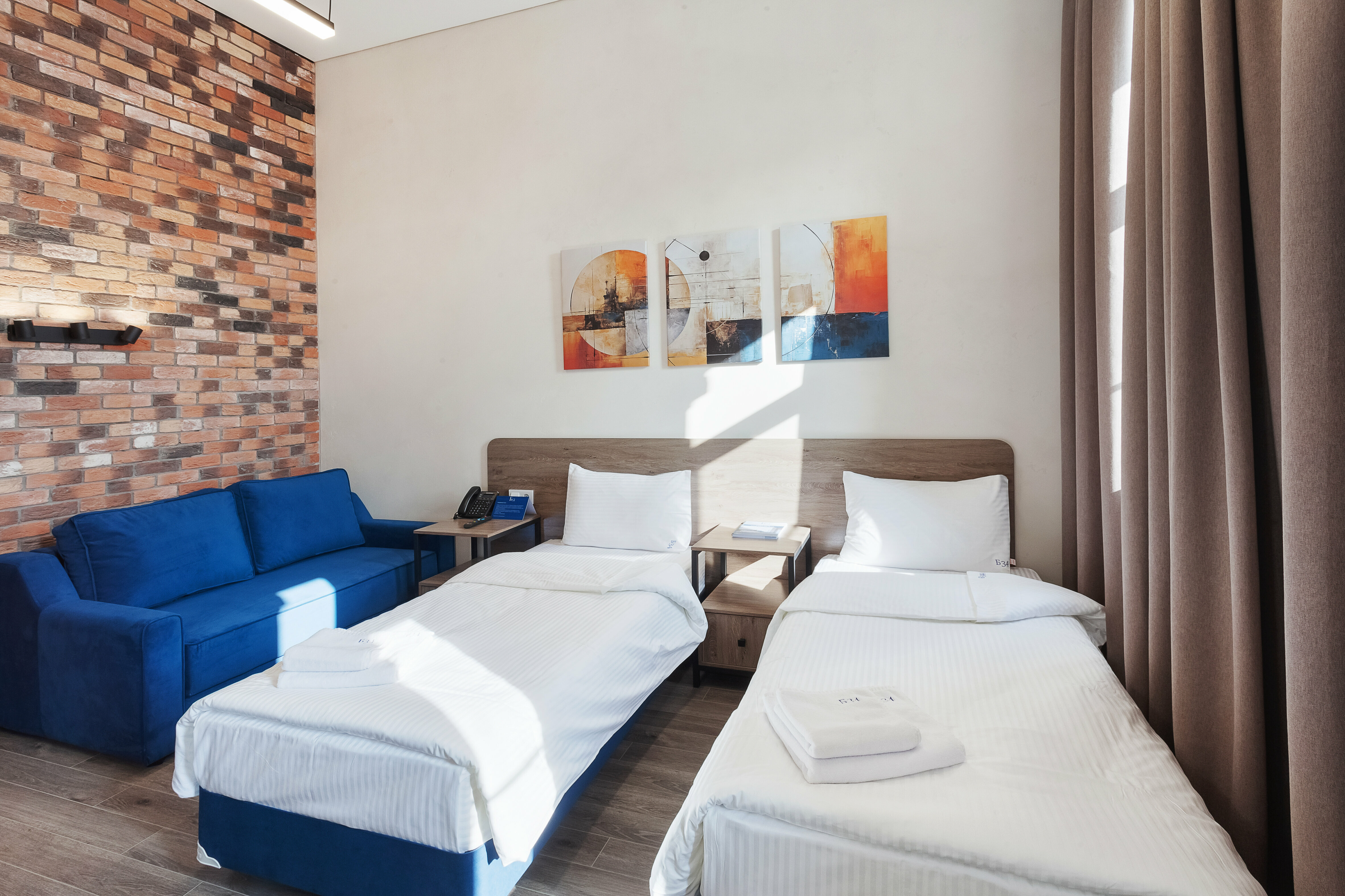 Улучшенный трехместный номер