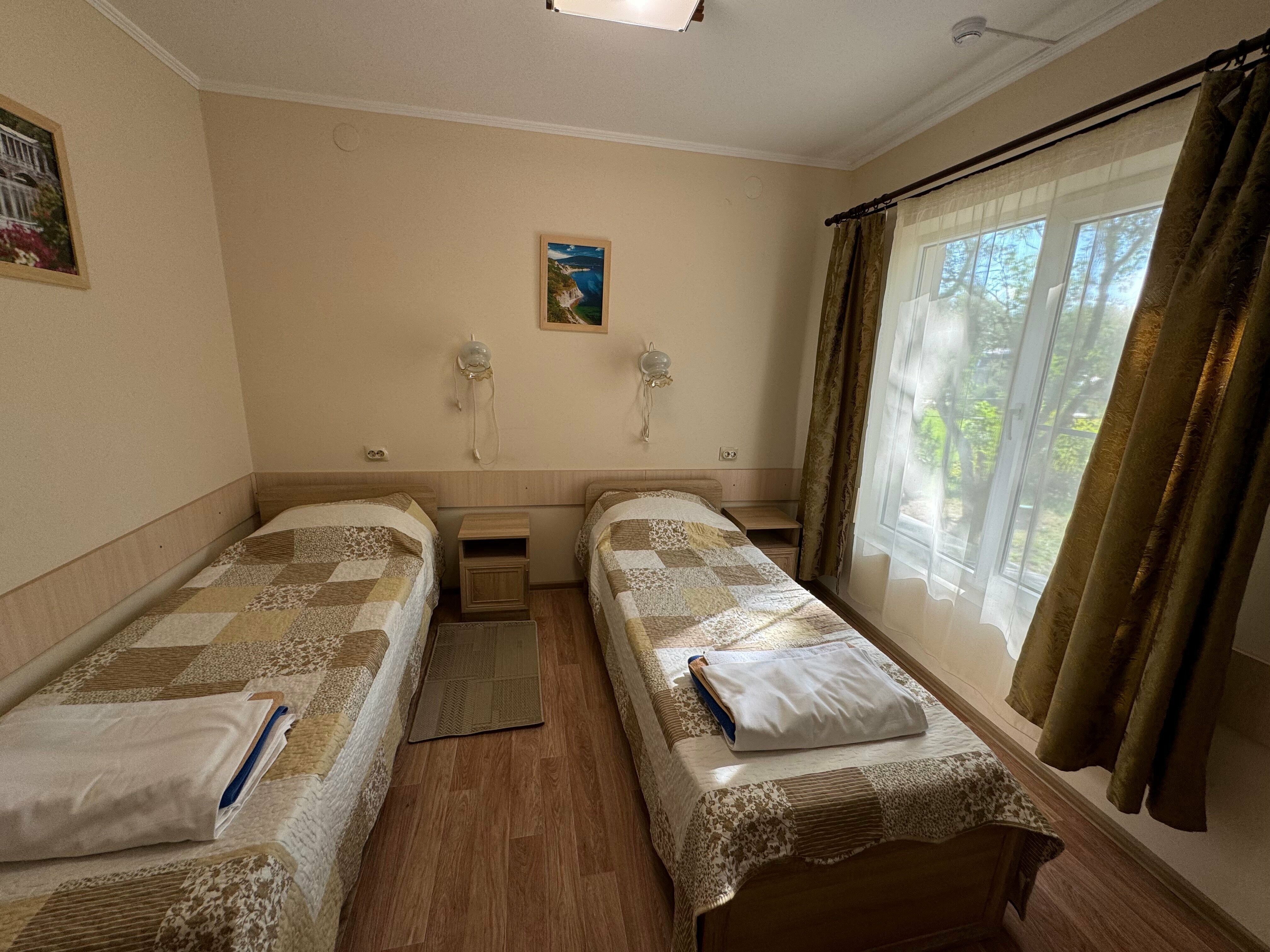 Двухместный номер с 2 двуспальными кроватями