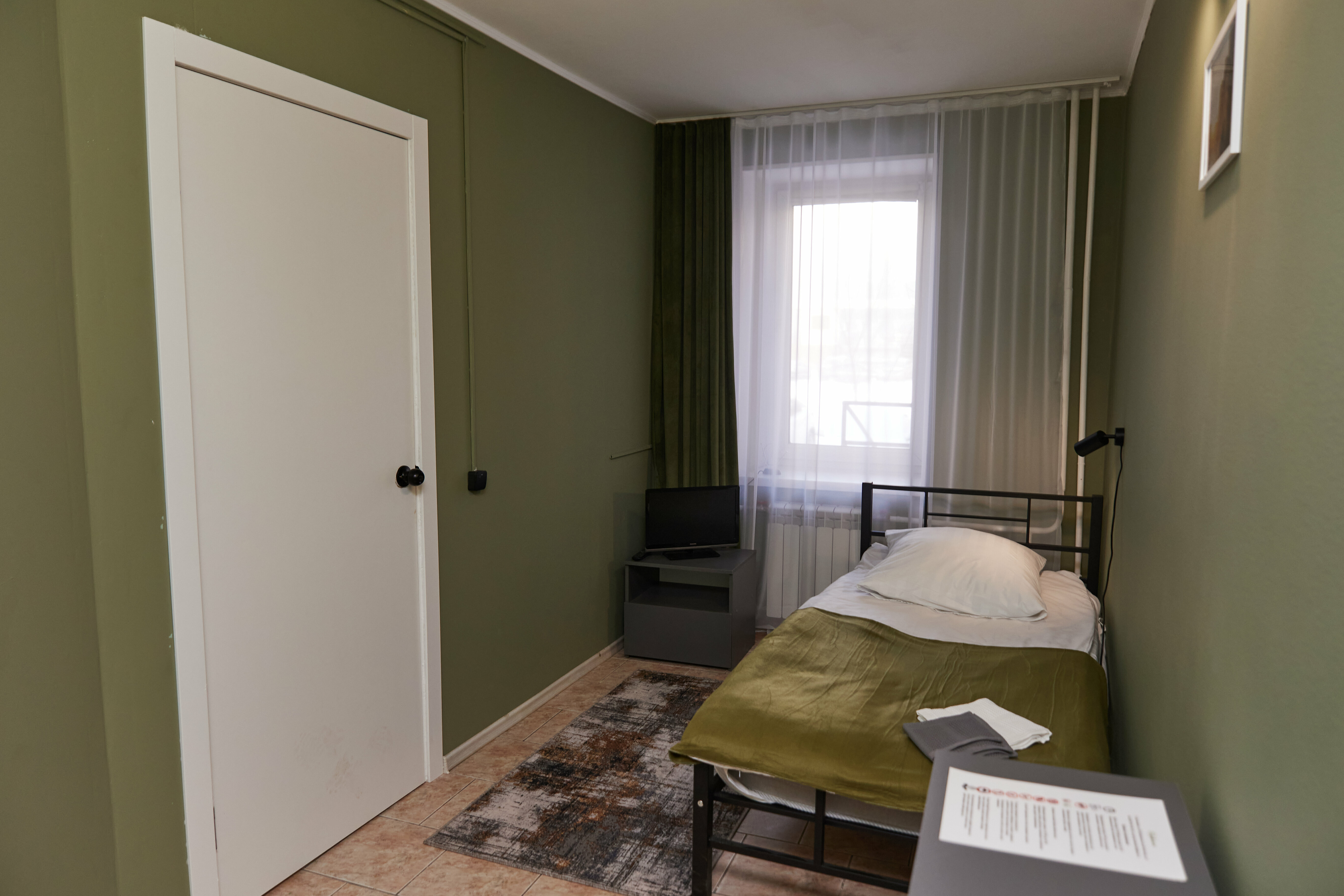 Одноместный номер с общим душем и туалетом