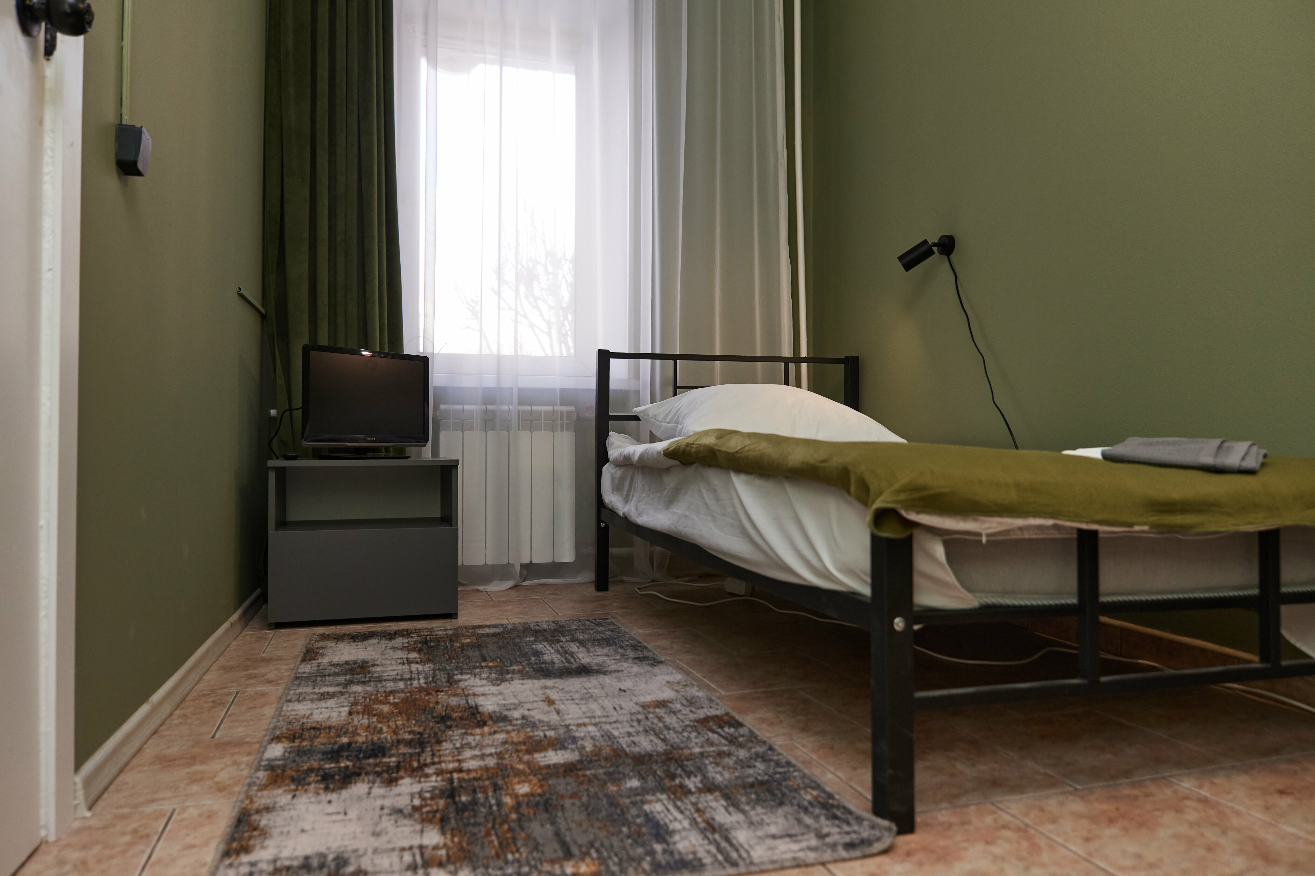 Одноместный номер с общим душем и туалетом