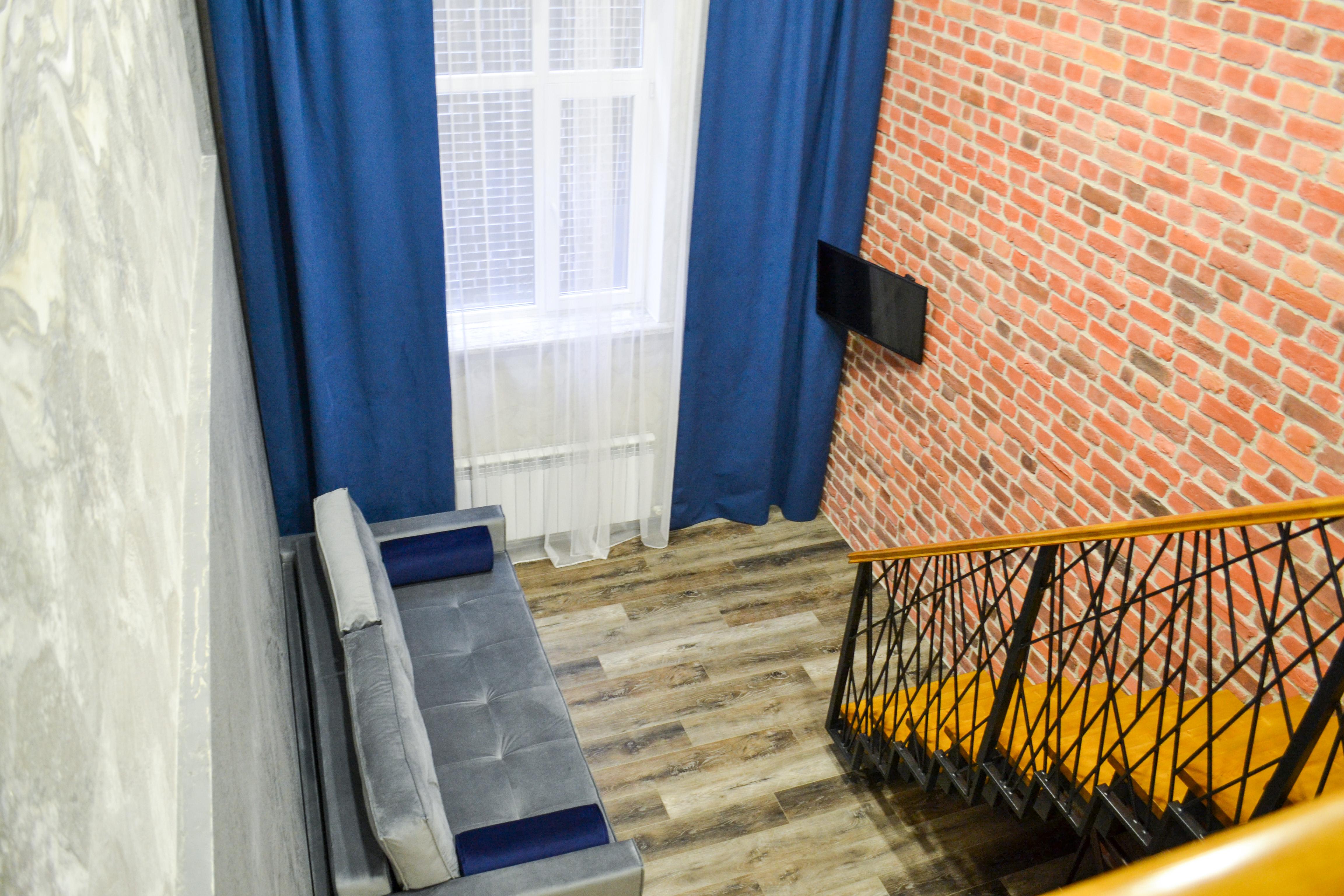 Двухуровневый номер категории "Лофт"