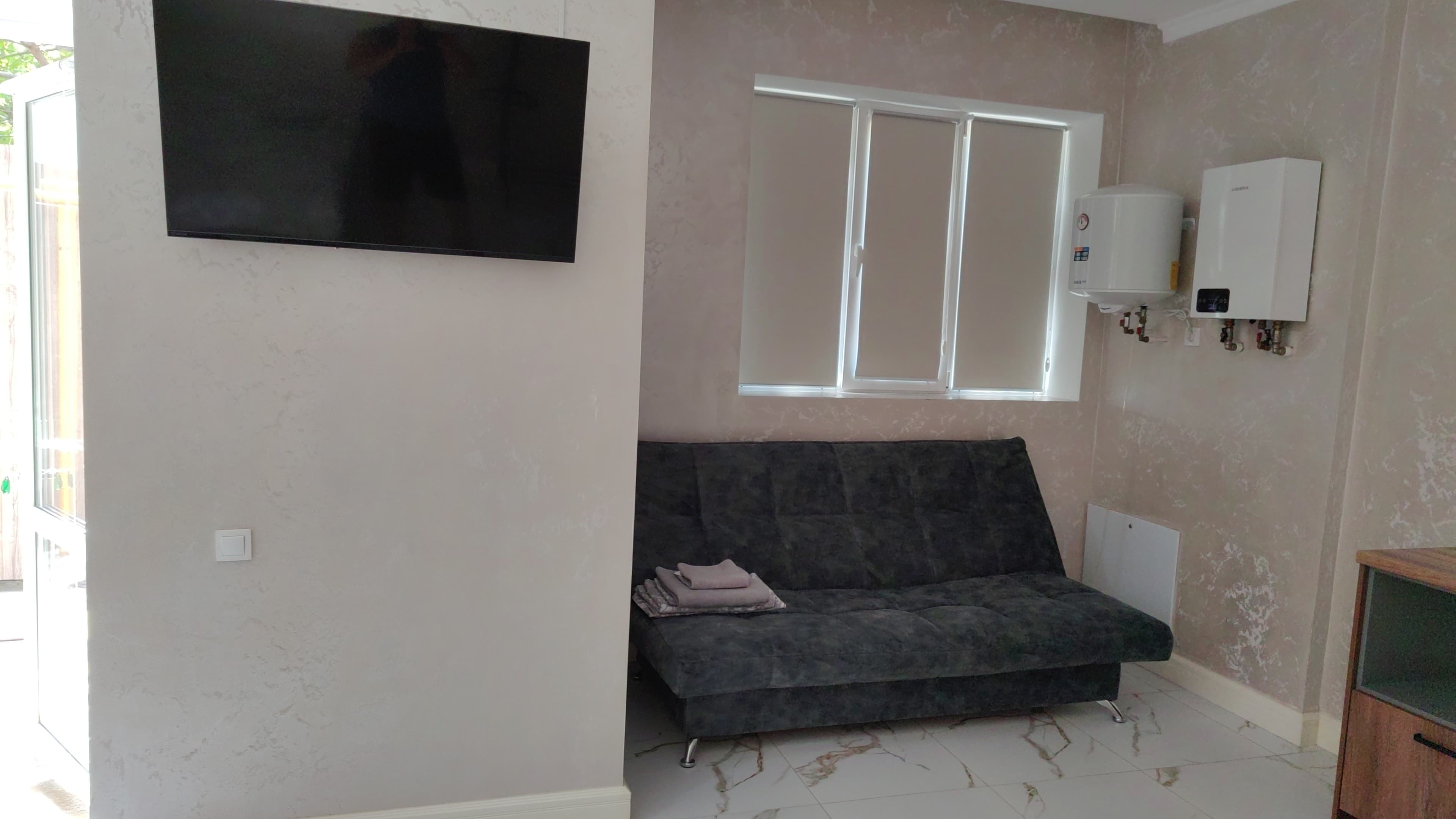 Четырехместный номер с видом на сад