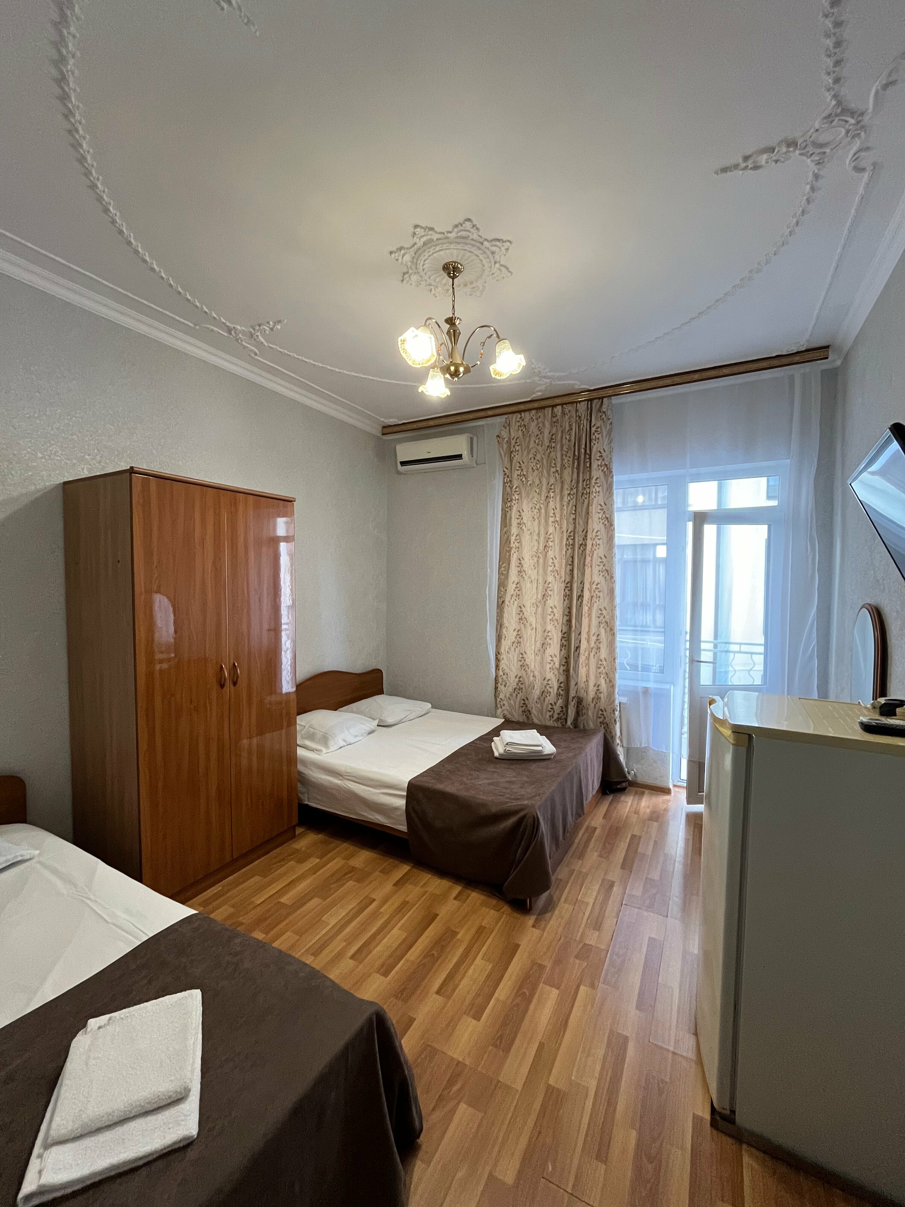 Трехместный номер с балконом