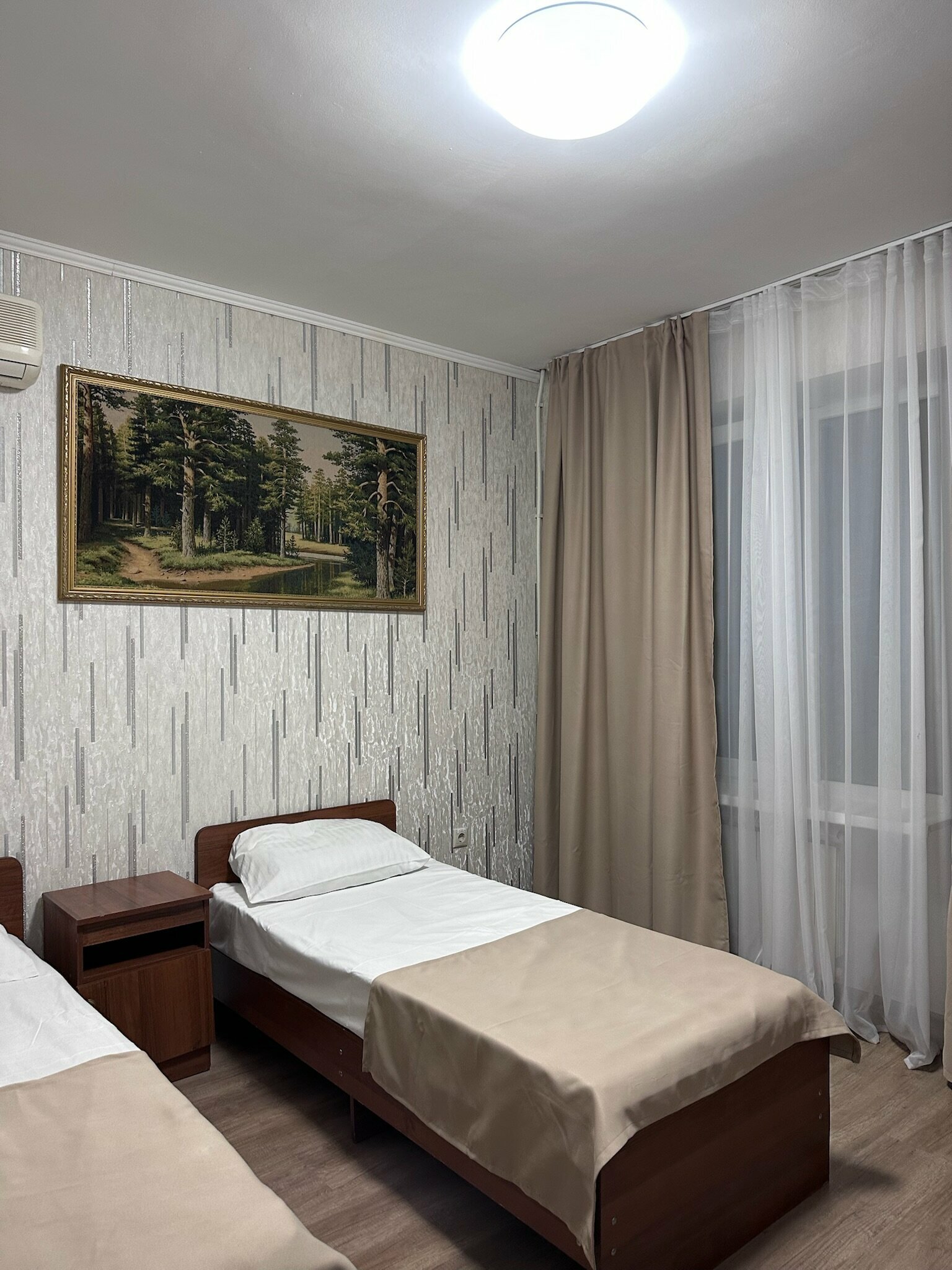 Трехместный номер с балконом