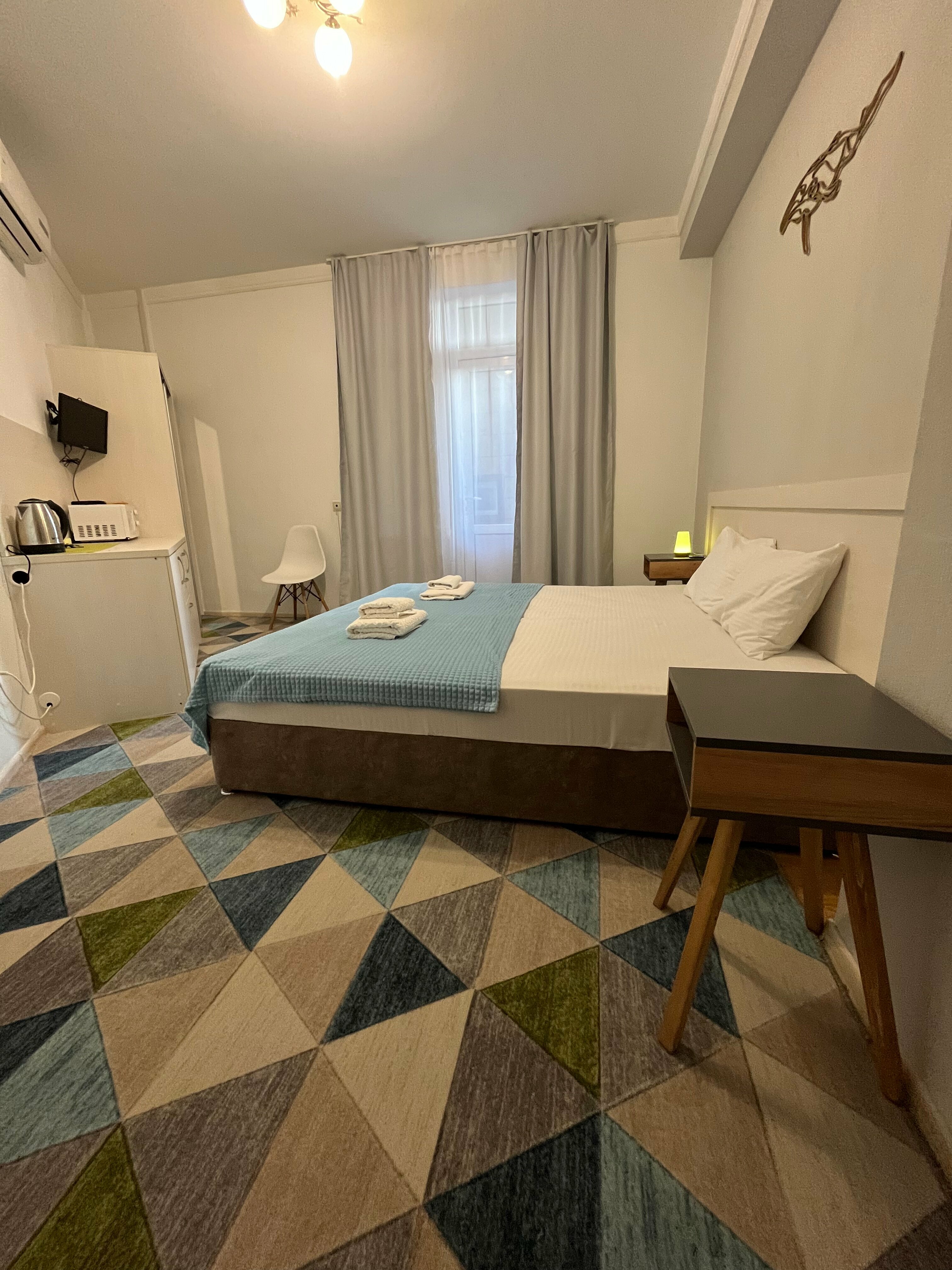 Улучшенный номер с кроватью "King-size" или двумя отдельными кроватями и доп. местом