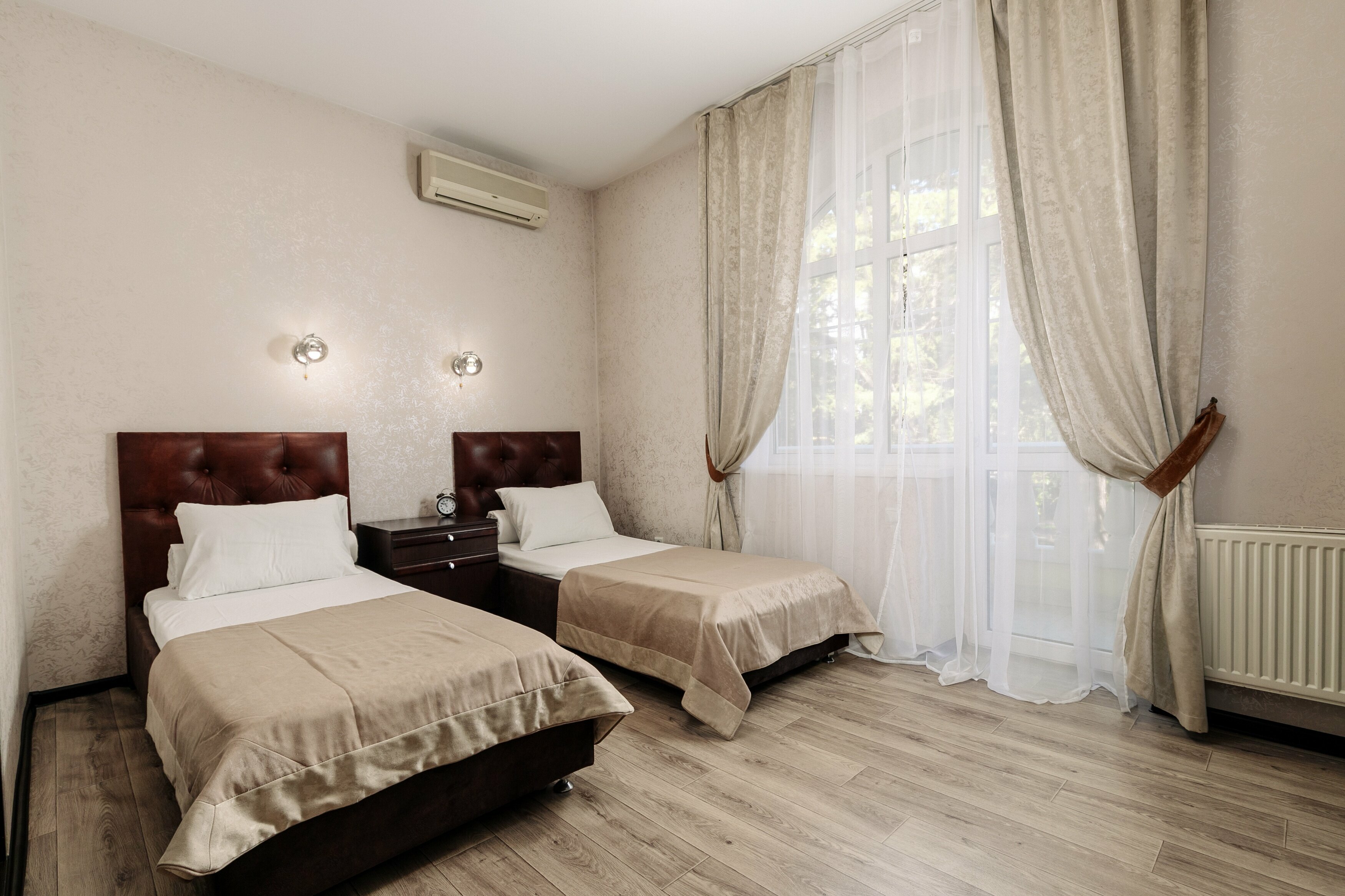 Двухместный номер с 2 отдельными кроватями и балконом