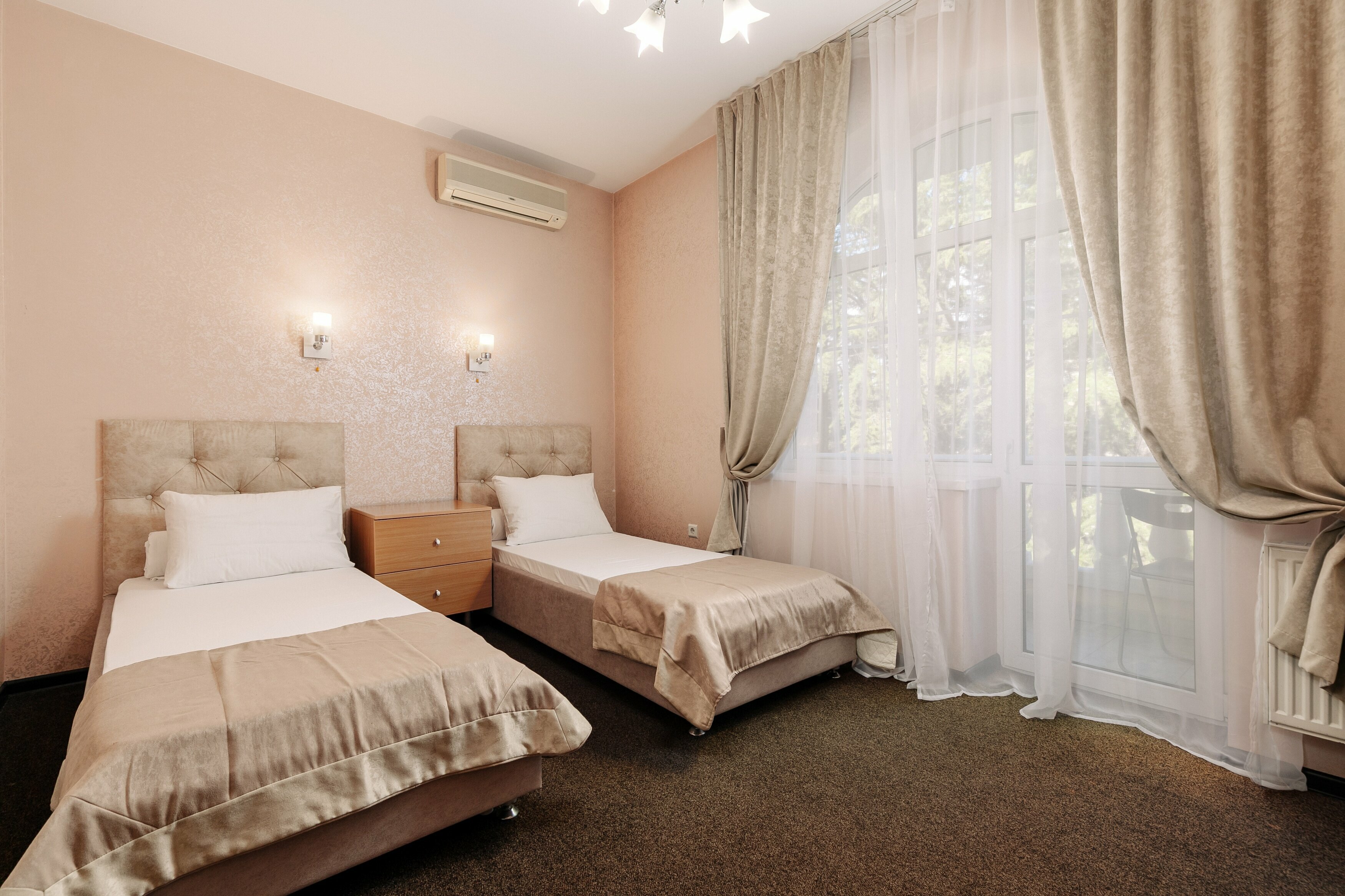 Двухместный номер с 2 отдельными кроватями и балконом