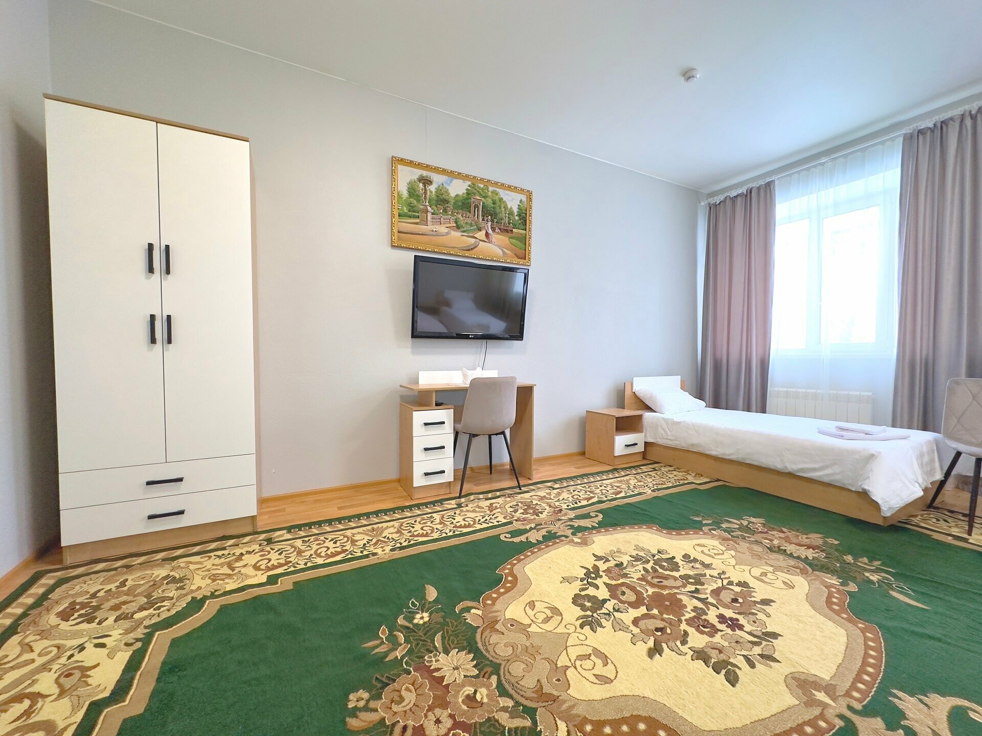 Трехместный номер с собственной ванной комнатой