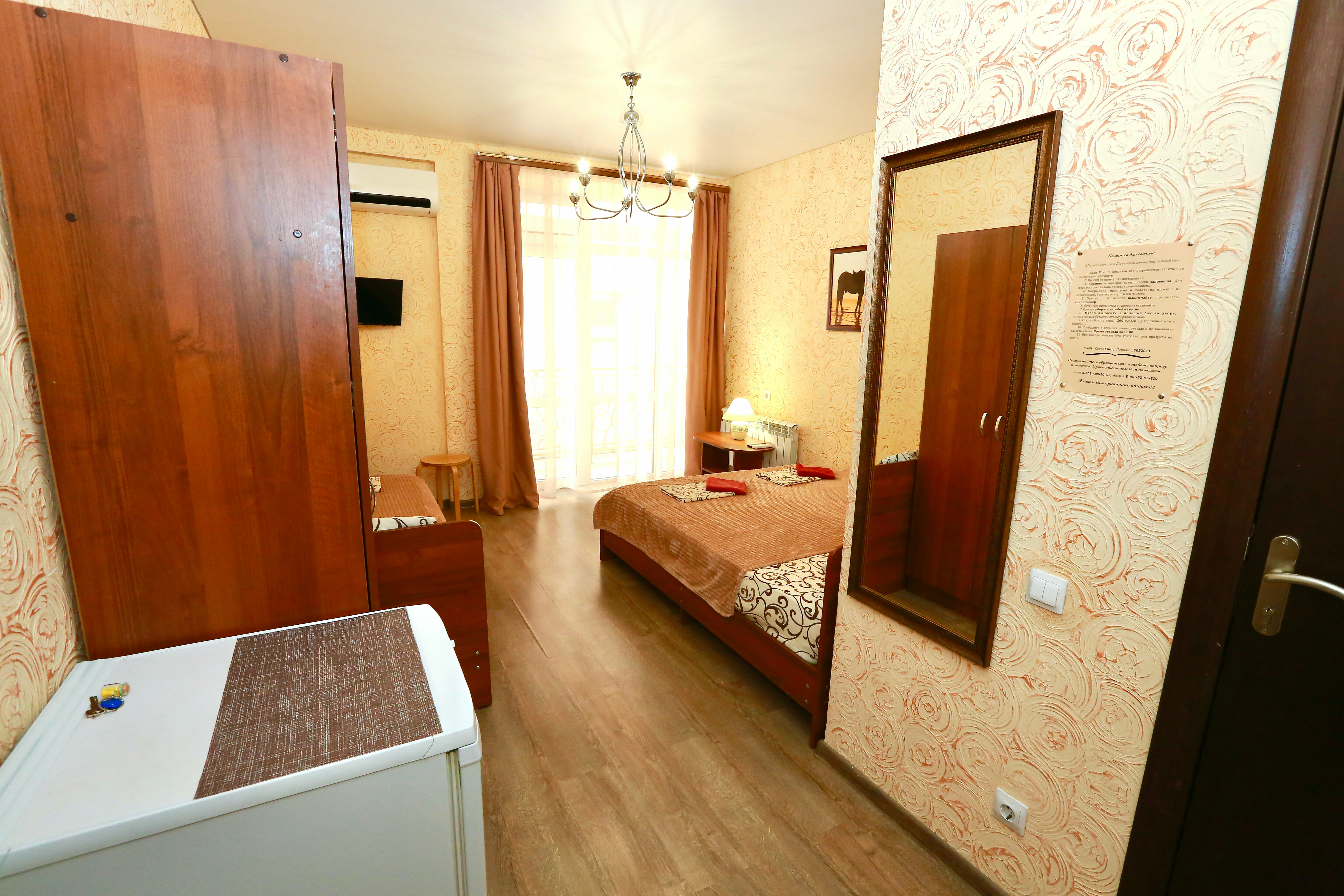 Трехместный номер с балконом на втором этаже