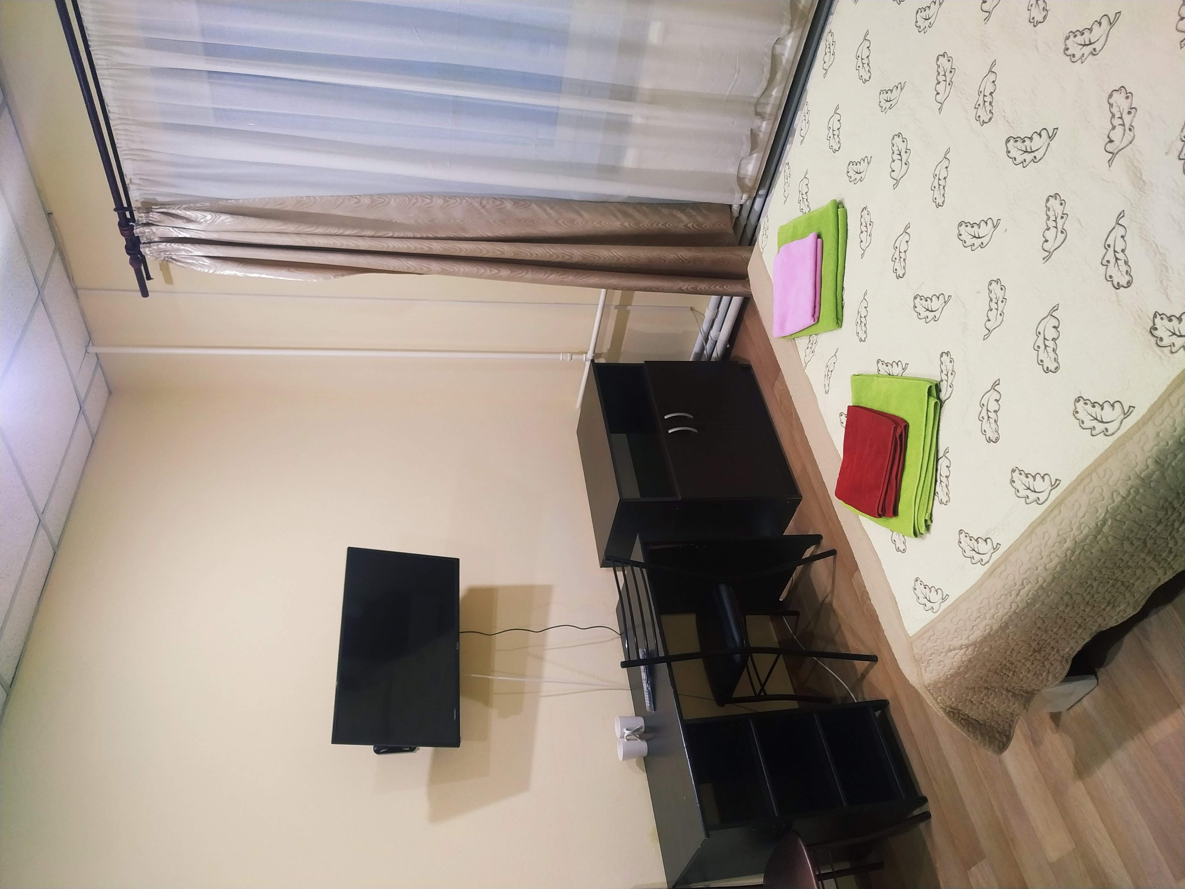 Двухместный номер с 2 отдельными кроватями и общей ванной комнатой