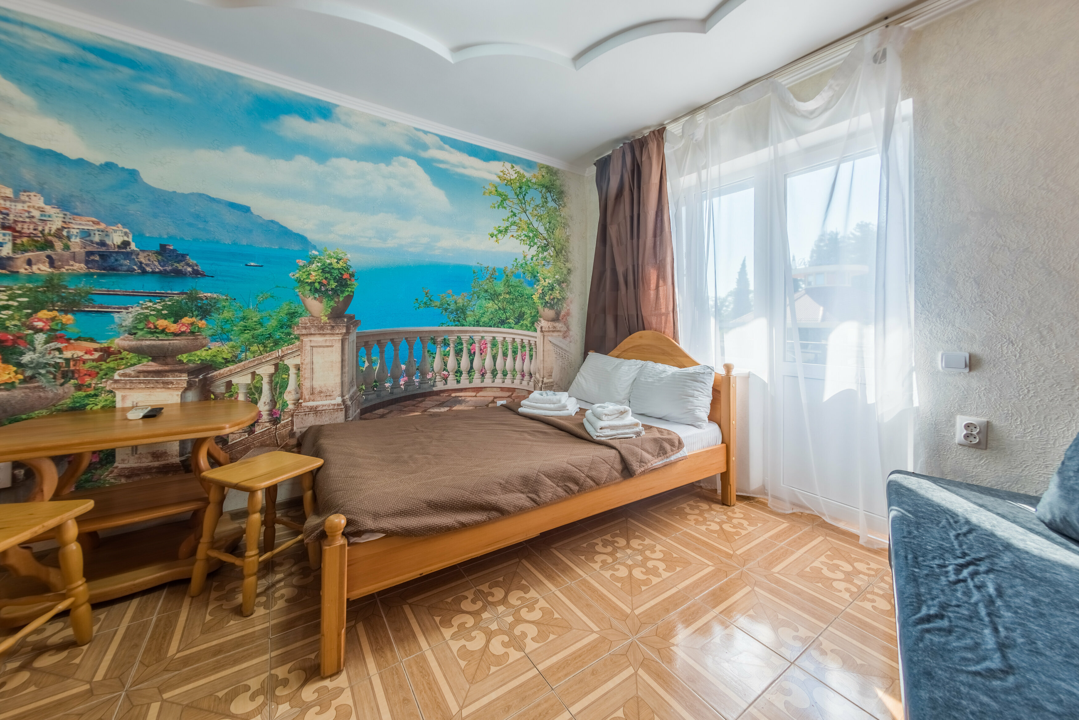 Трехместный номер с балконом