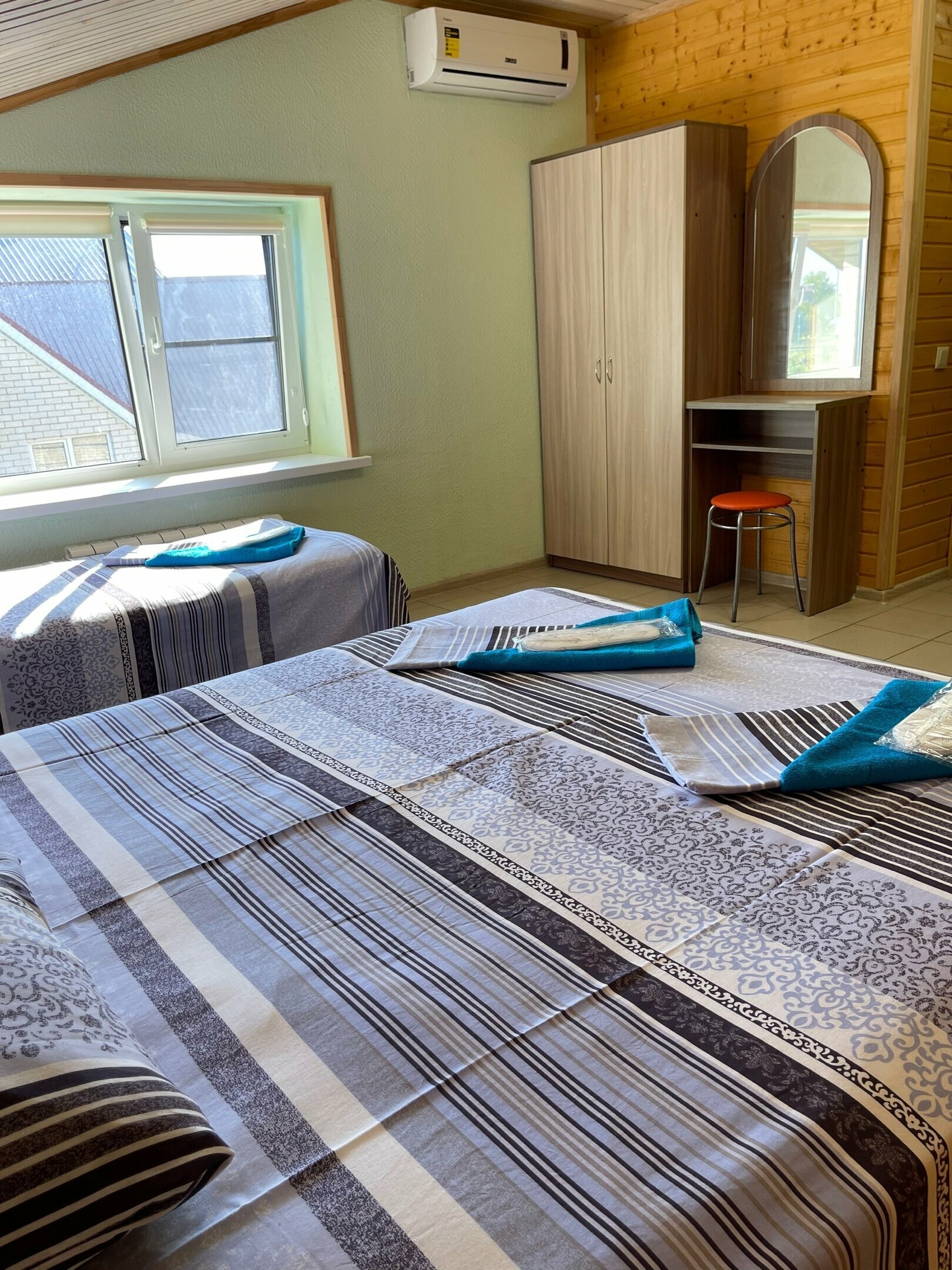 Улучшенный трехместный номер