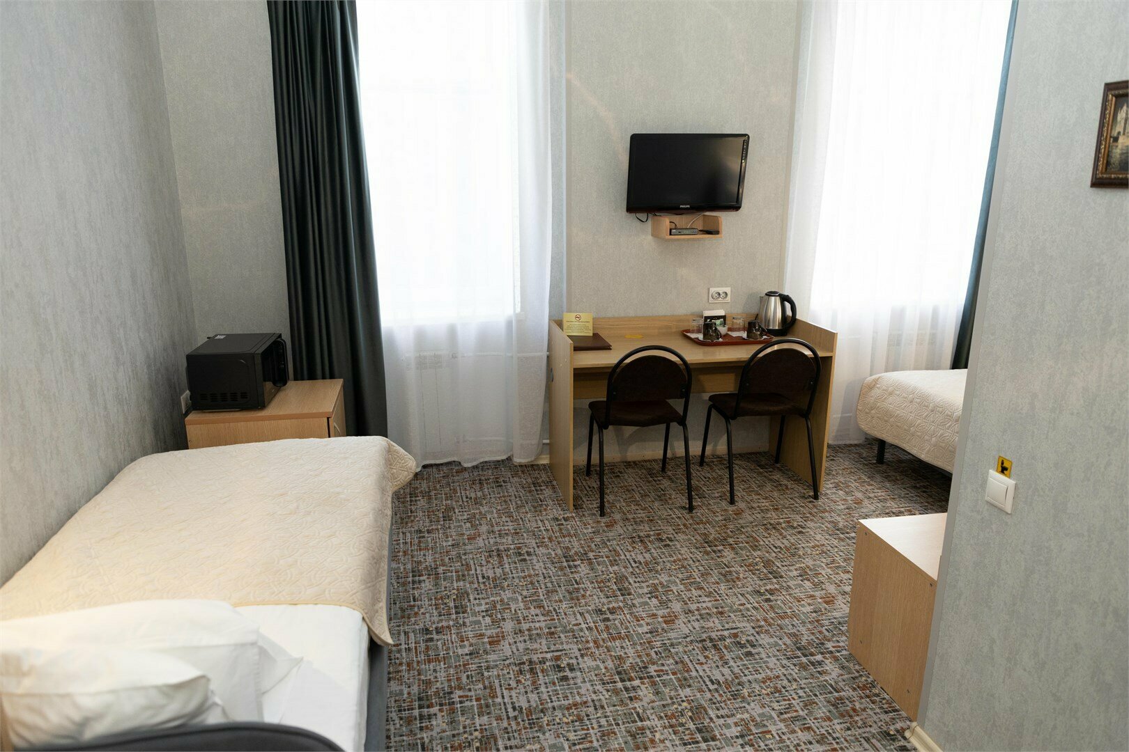 Двухместный номер Плюс с двумя отдельными кроватями