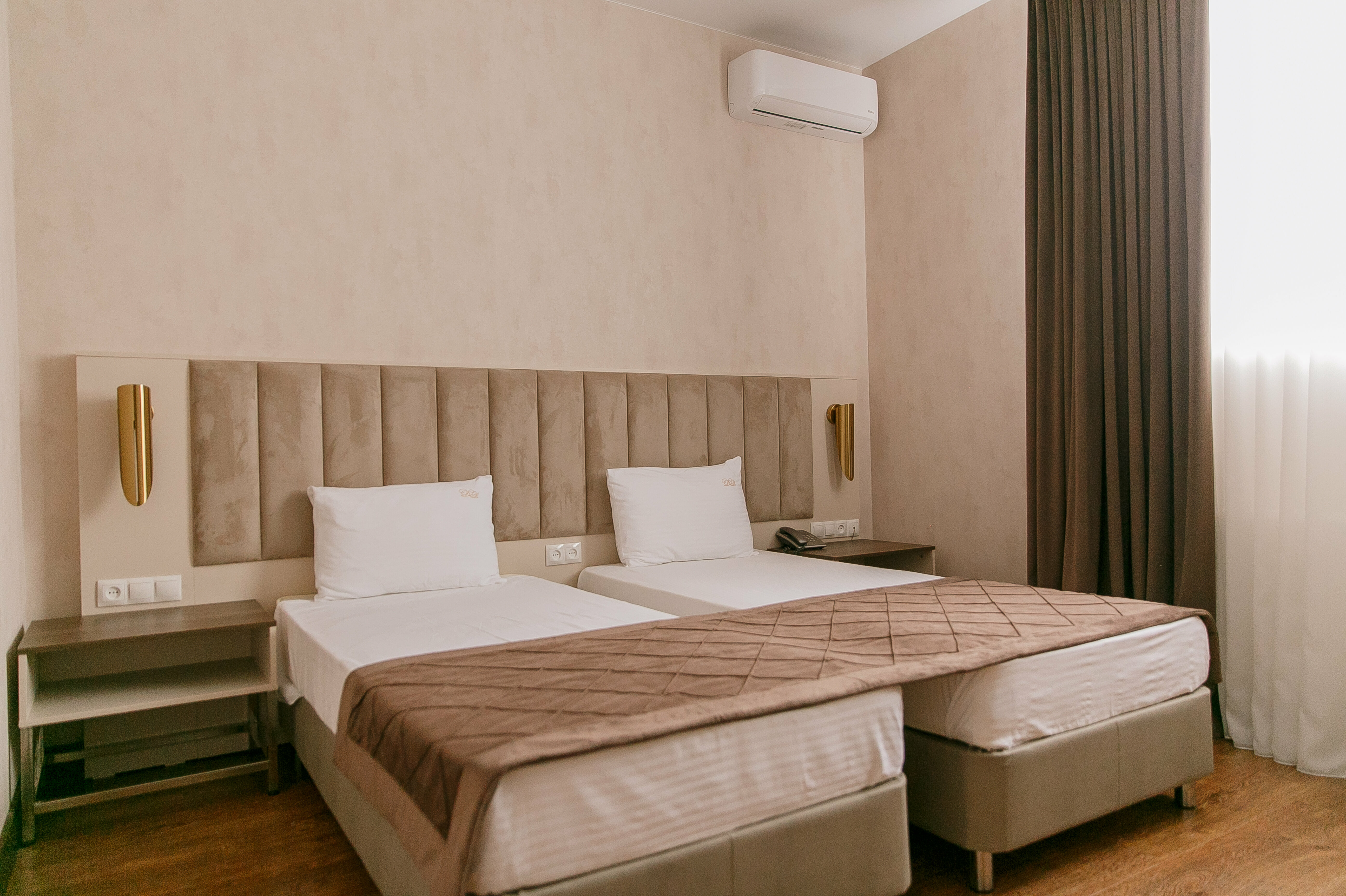 Улучшенный двухместный номер с 2 отдельными кроватями