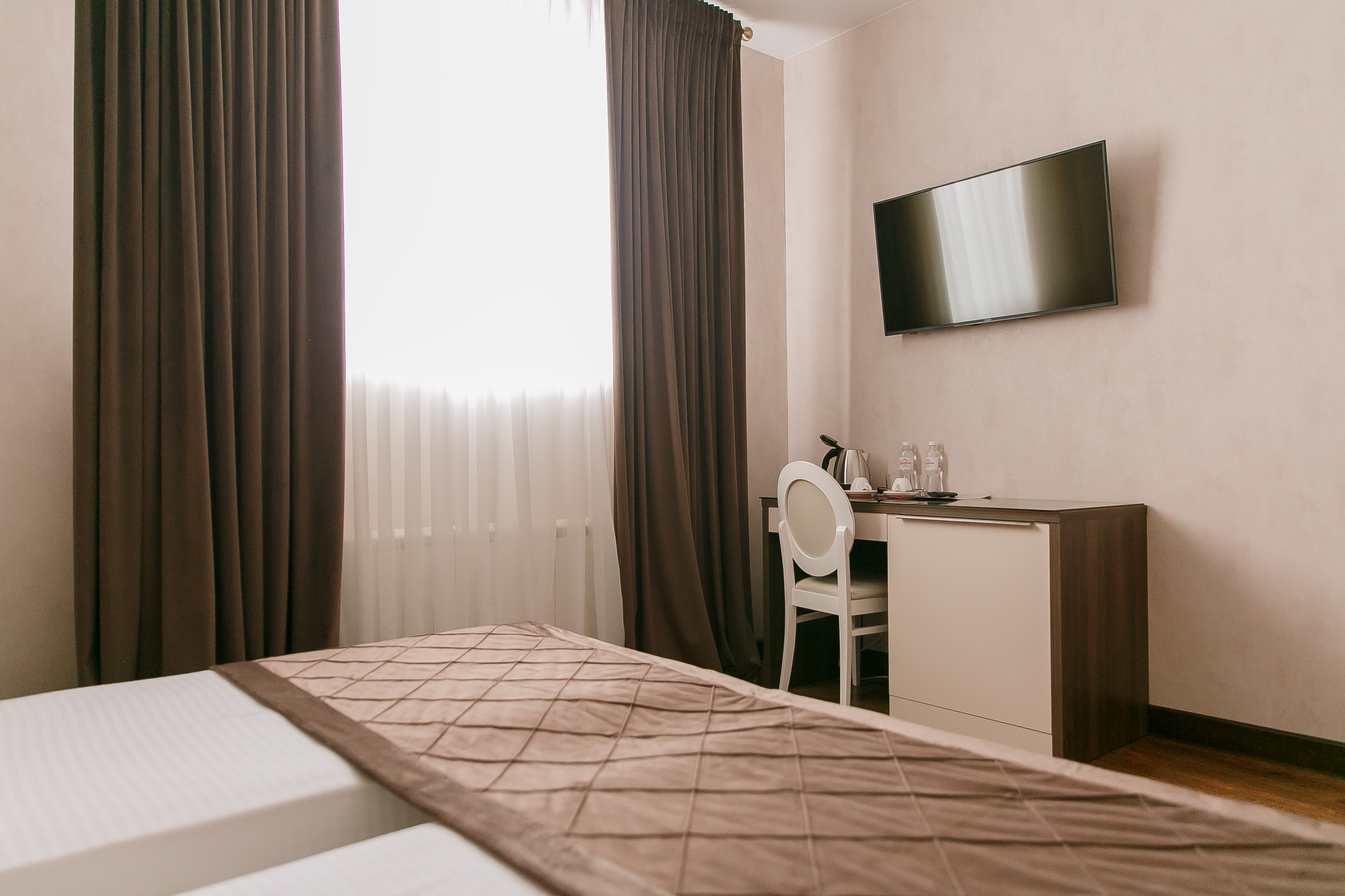 Улучшенный двухместный номер с 2 отдельными кроватями