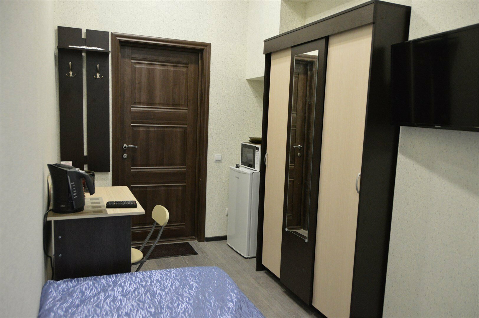 Комната для одного внешней ванной комнатой