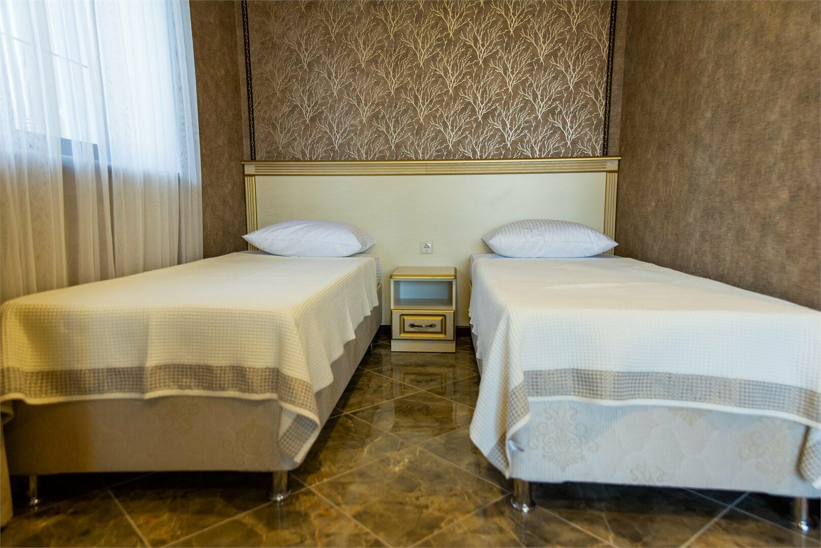 2-х местный стандарт с двумя раздельными кроватями и раскладным диваном