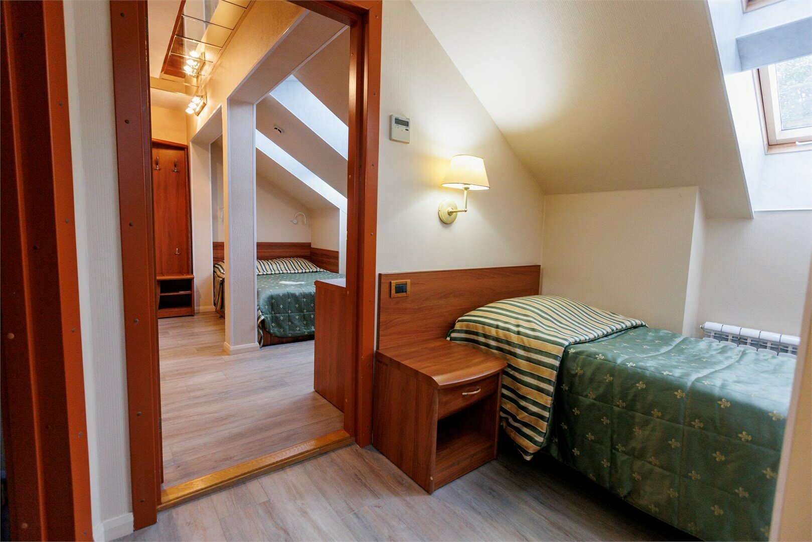 Четырехместный мансардный номер