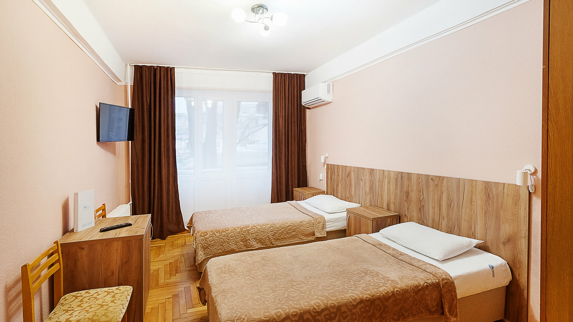 Улучшенный двухместный номер с 2 отдельными кроватями