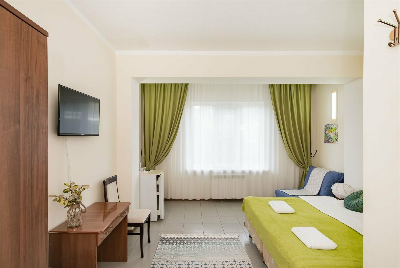 Улучшенный номер с кроватью размера «king-size» или 2 отдельными кроватями