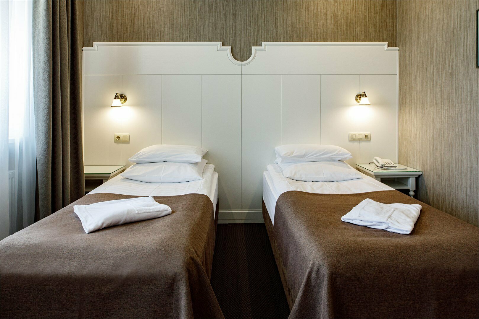 Двухместный номер с двуспальной или двумя односпальными кроватями