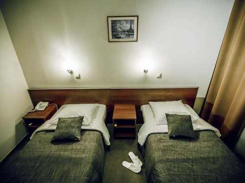 Двухместный номер с 2 отдельными кроватями и душем